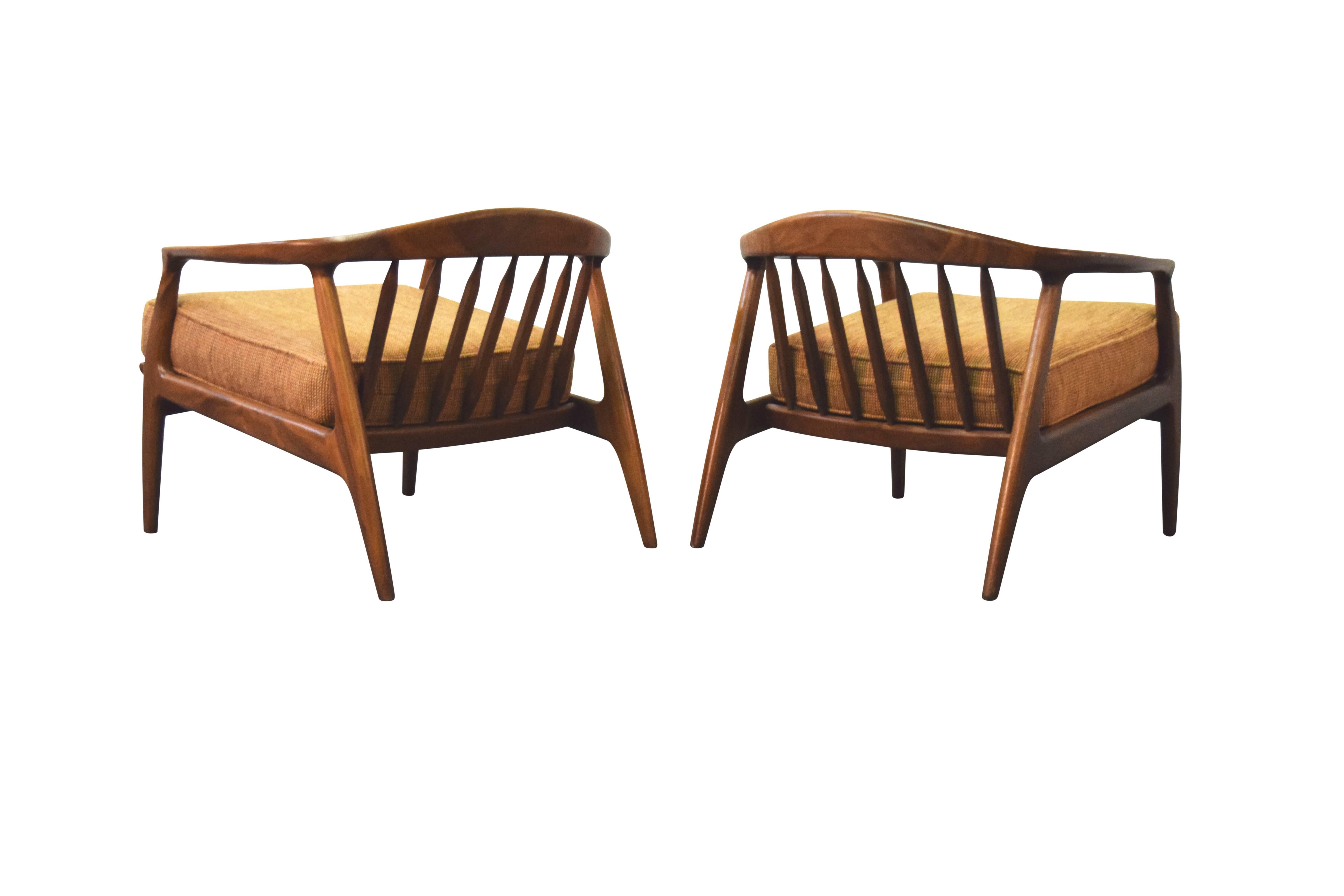 Milo Baughman for Thayer Coggin walnut lounge chairs.