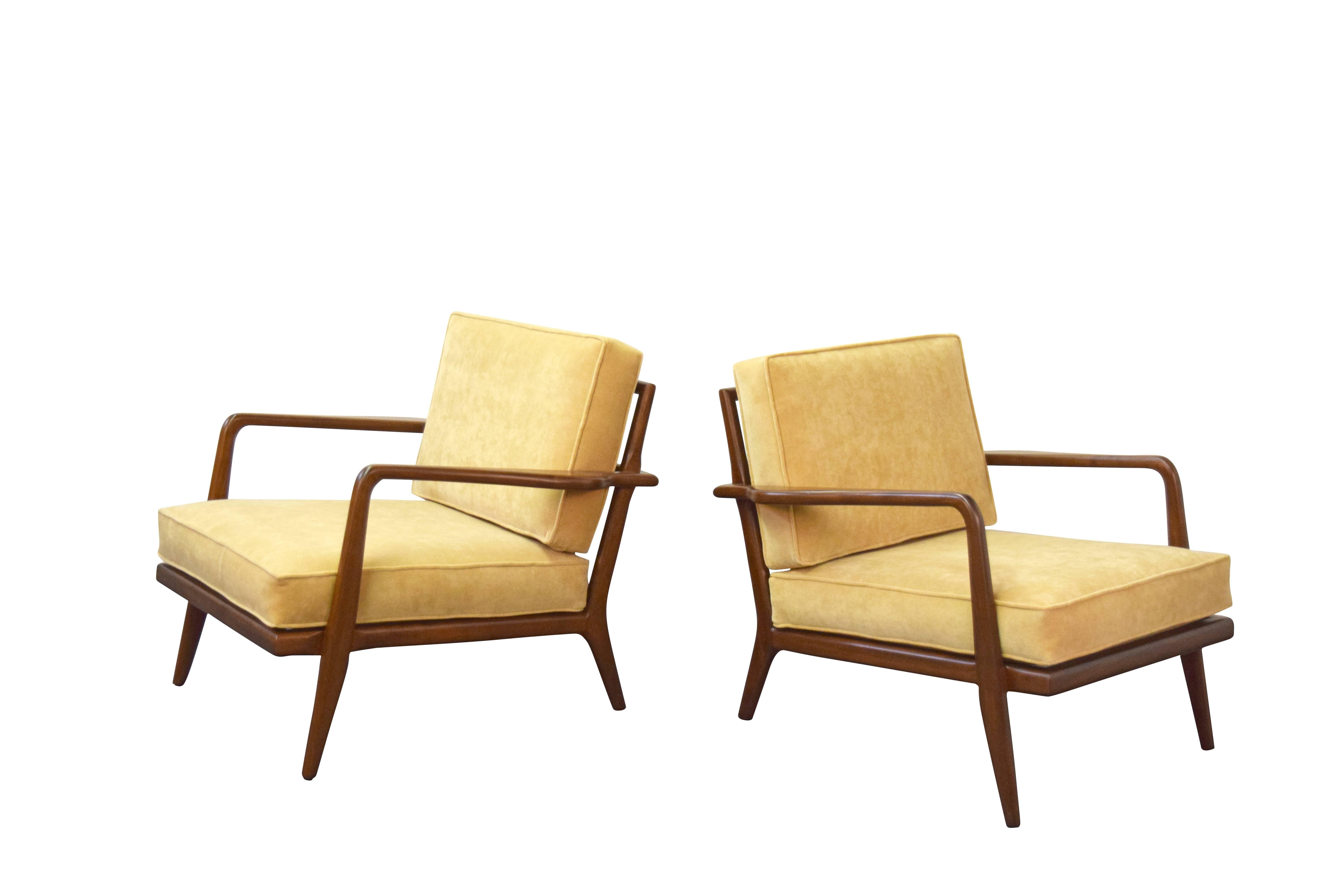 Pair of Mel Smilow walnut lounge chairs. Chairs have been restored and reupholstered in a soft velvet.