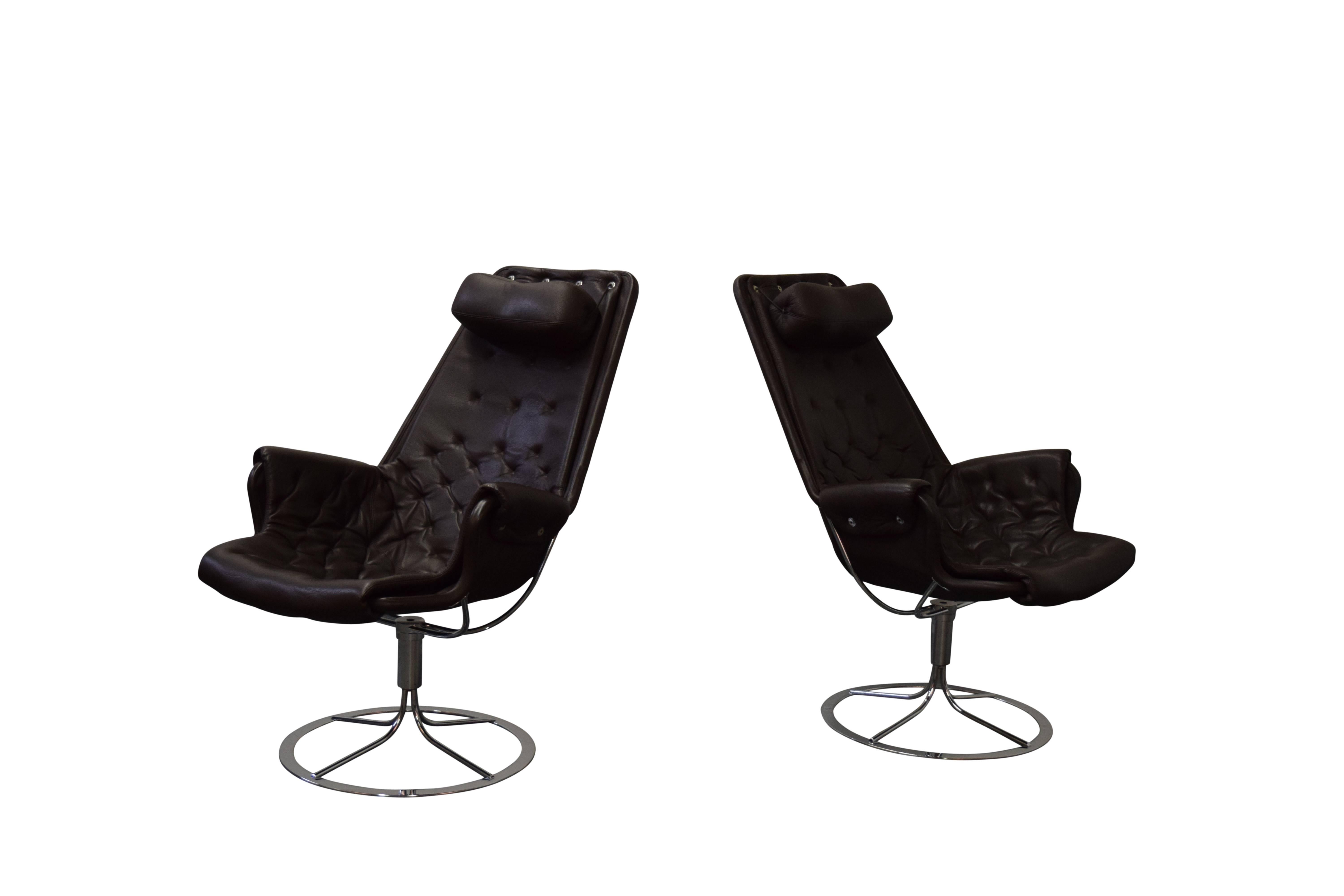 Pair of Bruno Mathsson for DUX Jetson lounge chairs. Chairs are signed and feature original leather upholstery.