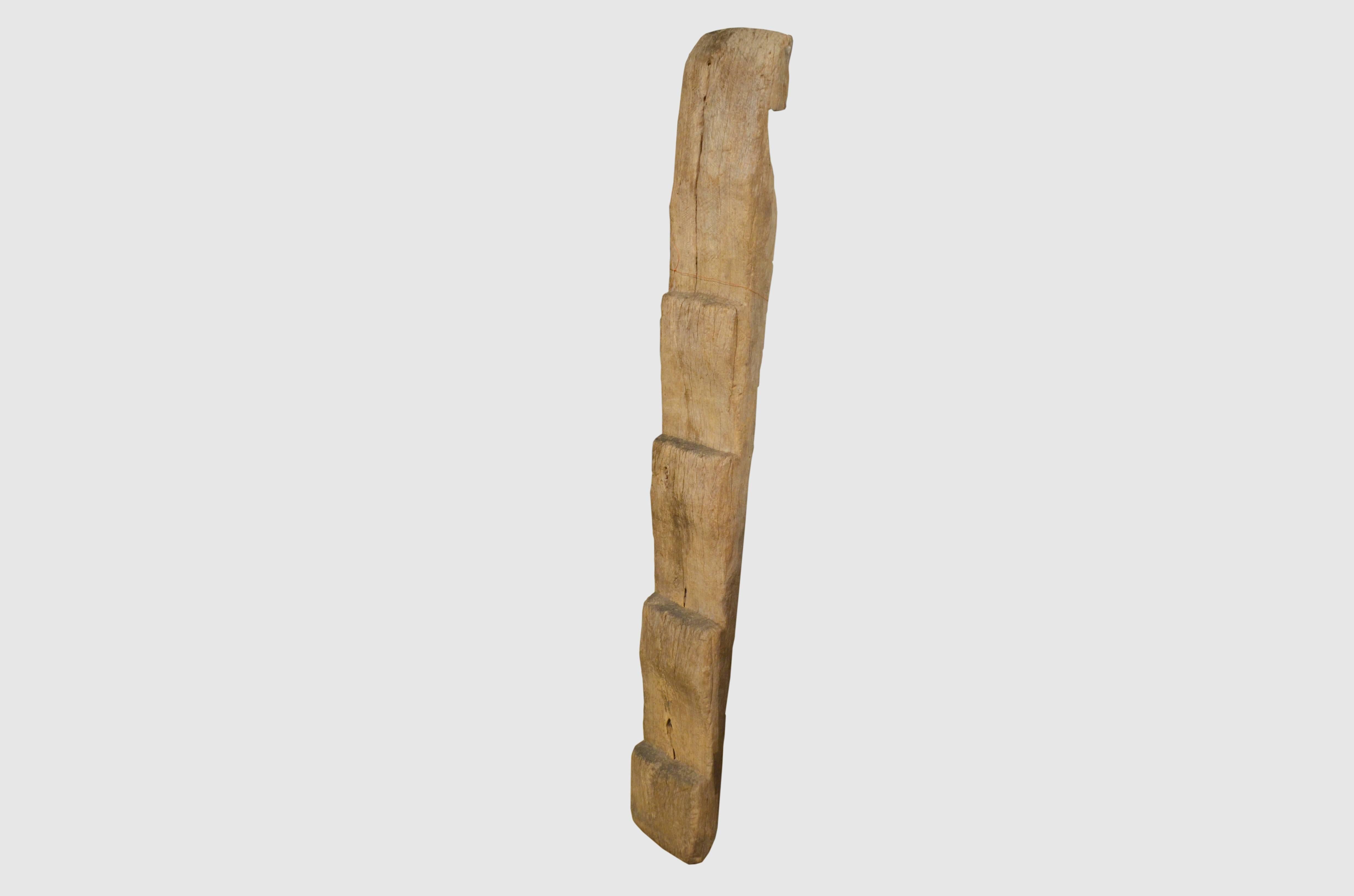 Primitive teak wood ladder hand-carved from a single slab. For the Primitive collector.

This ladder was sourced in the spirit of wabi-sabi, a Japanese philosophy that beauty can be found in imperfection and impermanence. It’s a beauty of things