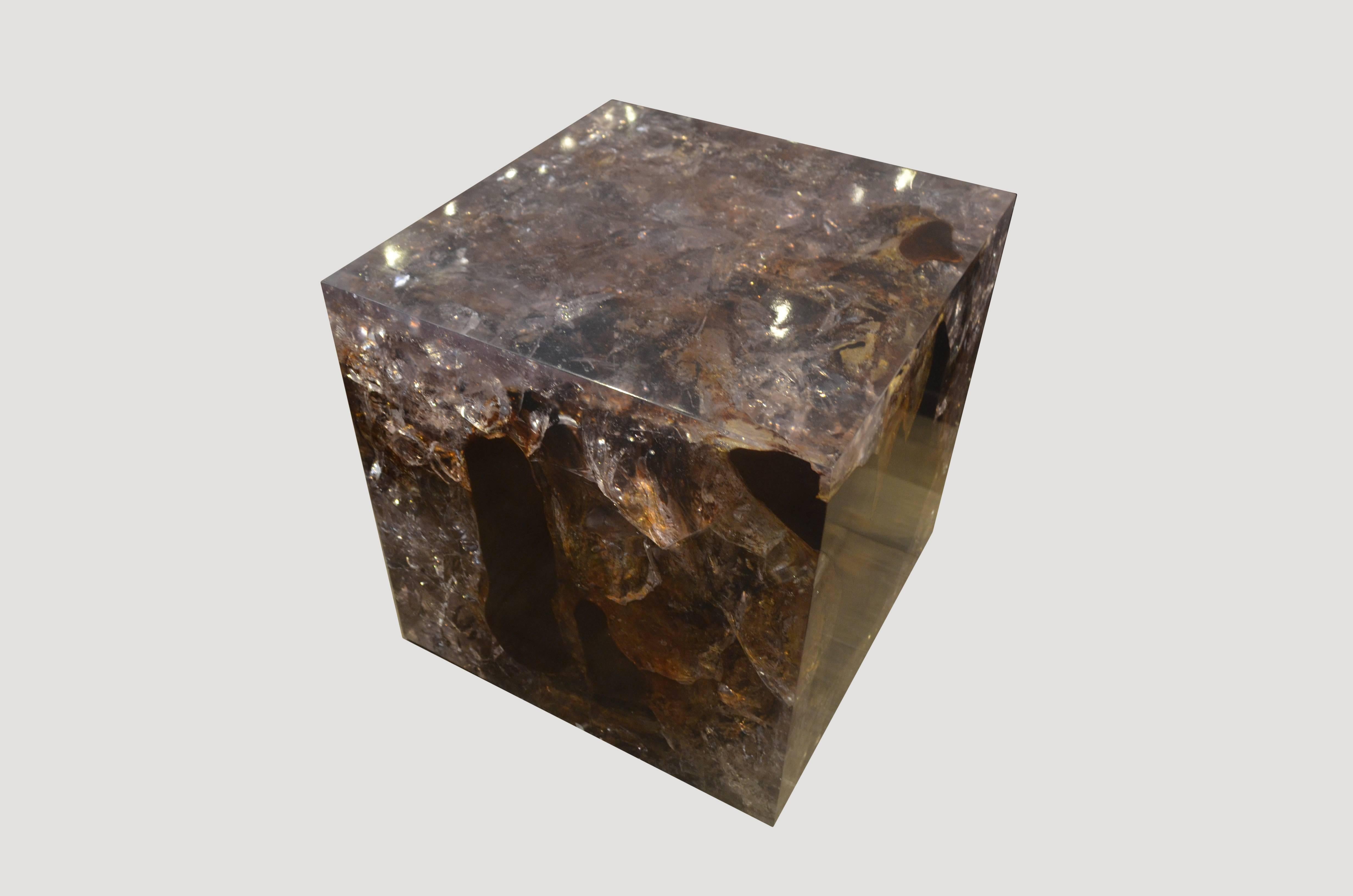 The cracked resin cocktail table is made from teak infused with resin. A dramatic piece due to the depth of the resin, which resembles a unique quartz crystal with many different facets. An impressive addition to any space.

The Cracked Resin