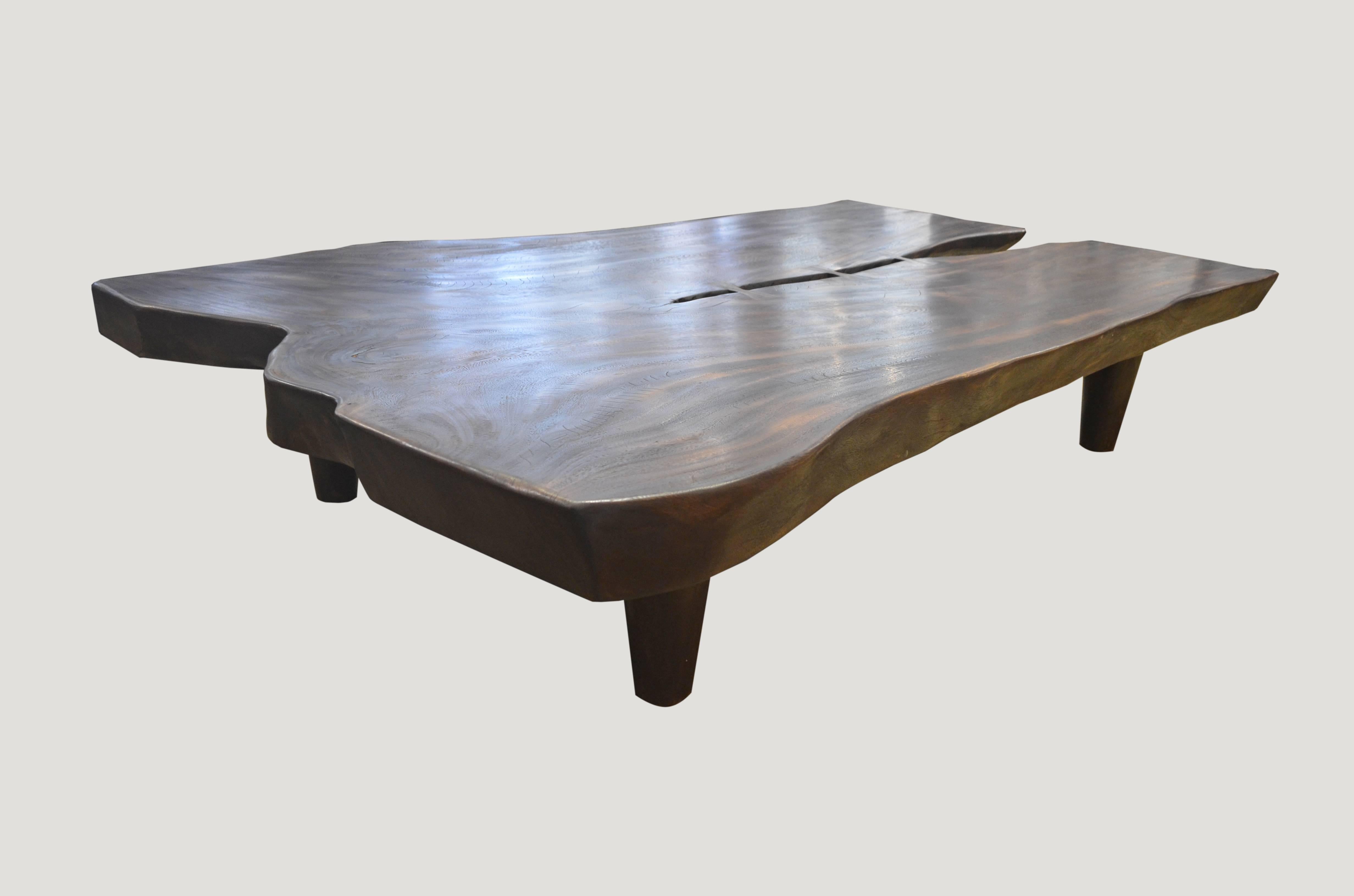 Single four thick suar wood coffee table. Burnt, sanded and sealed one time to produce a rich, chocolate finish with impressive depth, a result unachievable using standard stains and finishes. We have added butterfly details. A perfect combination