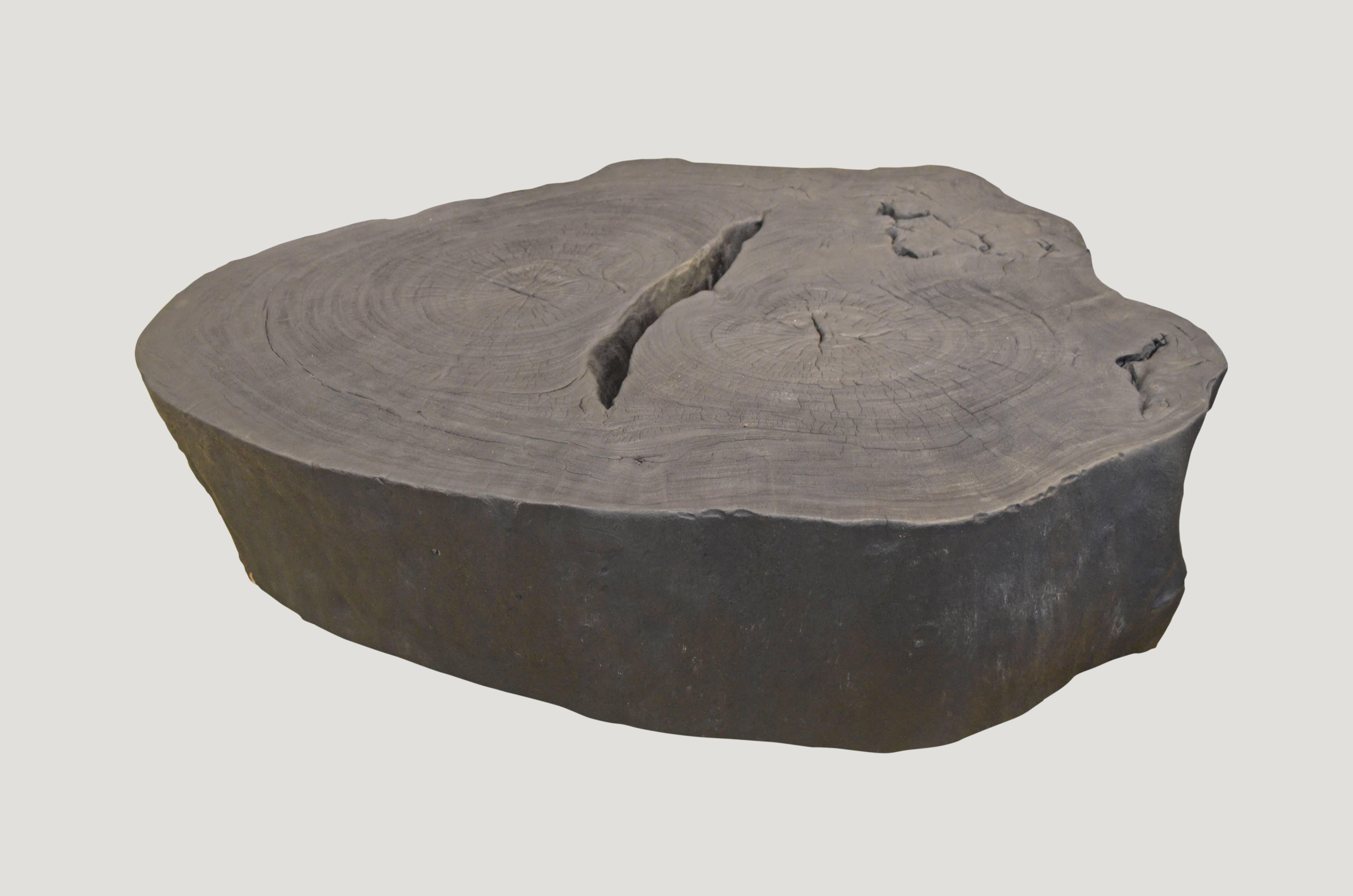 Impressive single reclaimed root coffee table. Burnt, sanded and sealed. Organic is the new modern.

The Triple Burnt collection represents a unique line of modern furniture made from solid organic wood. Burnt three times to produce a rich, charcoal