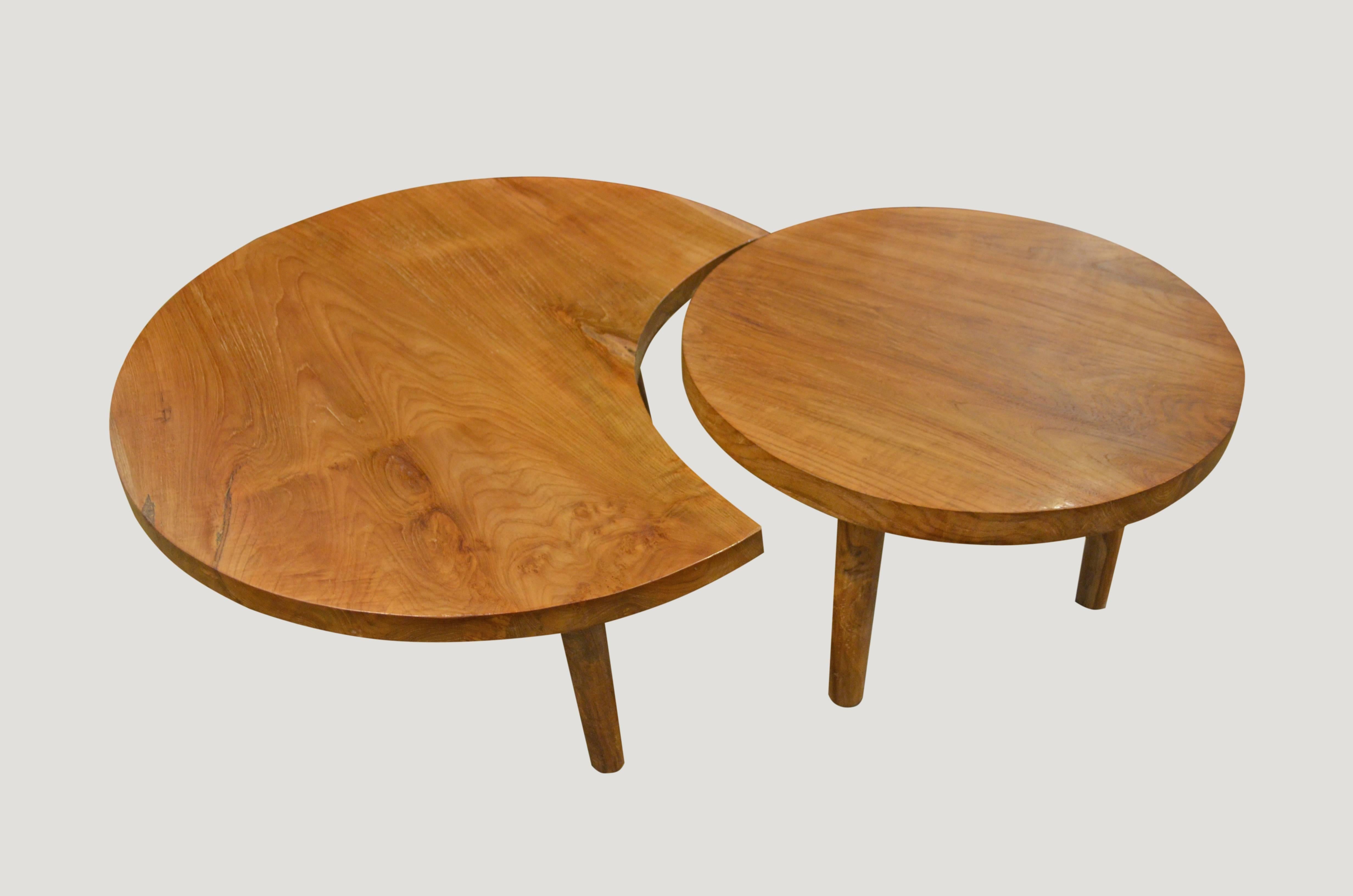 Single slab, reclaimed natural teak coffee or side table floating on Mid-Century style legs. The price and dimensions reflect the moon shaped table. Many shapes and sizes available. Please inquire.