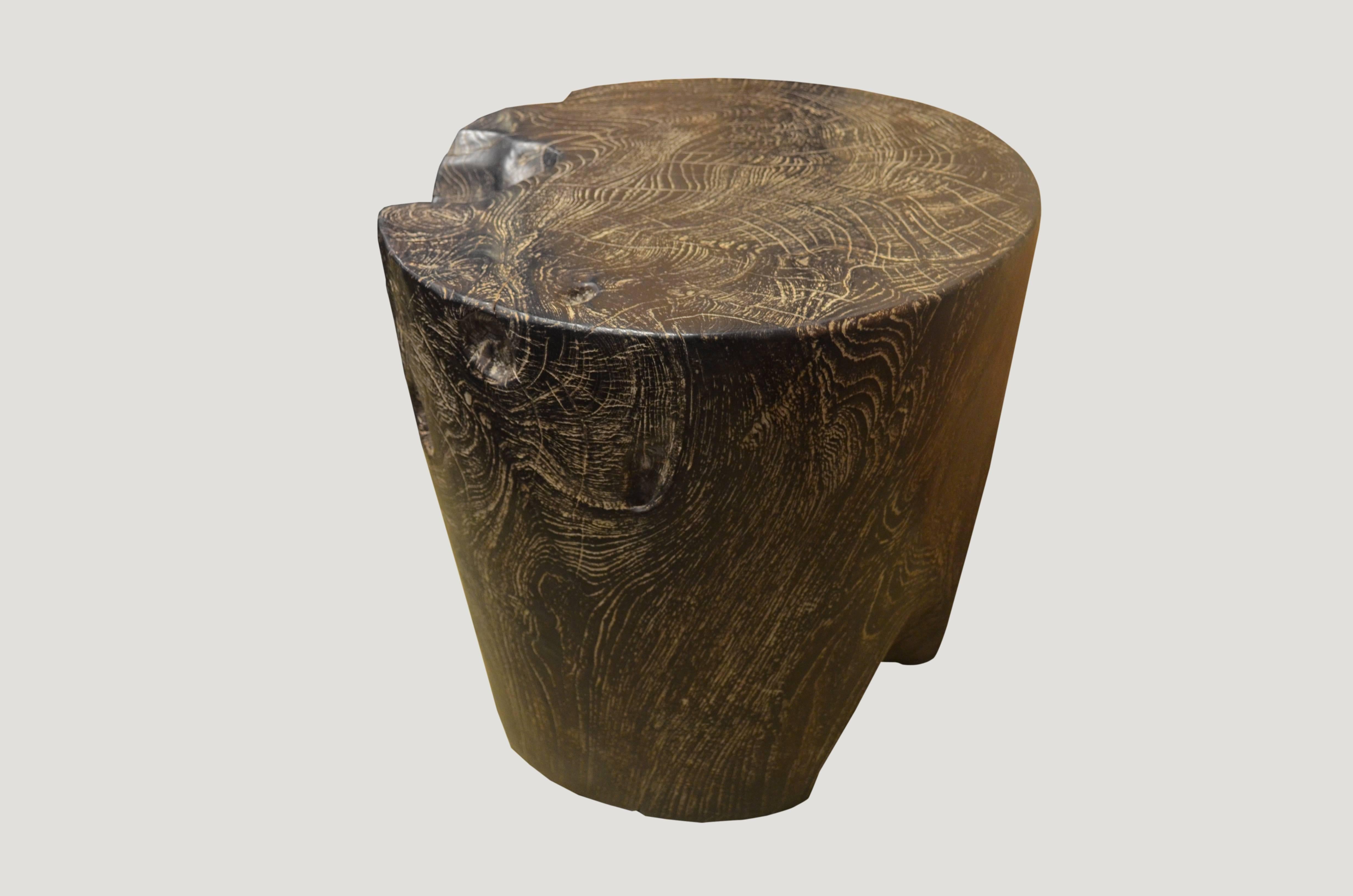 Beautiful side table or stool carved from a single aged reclaimed teak root.