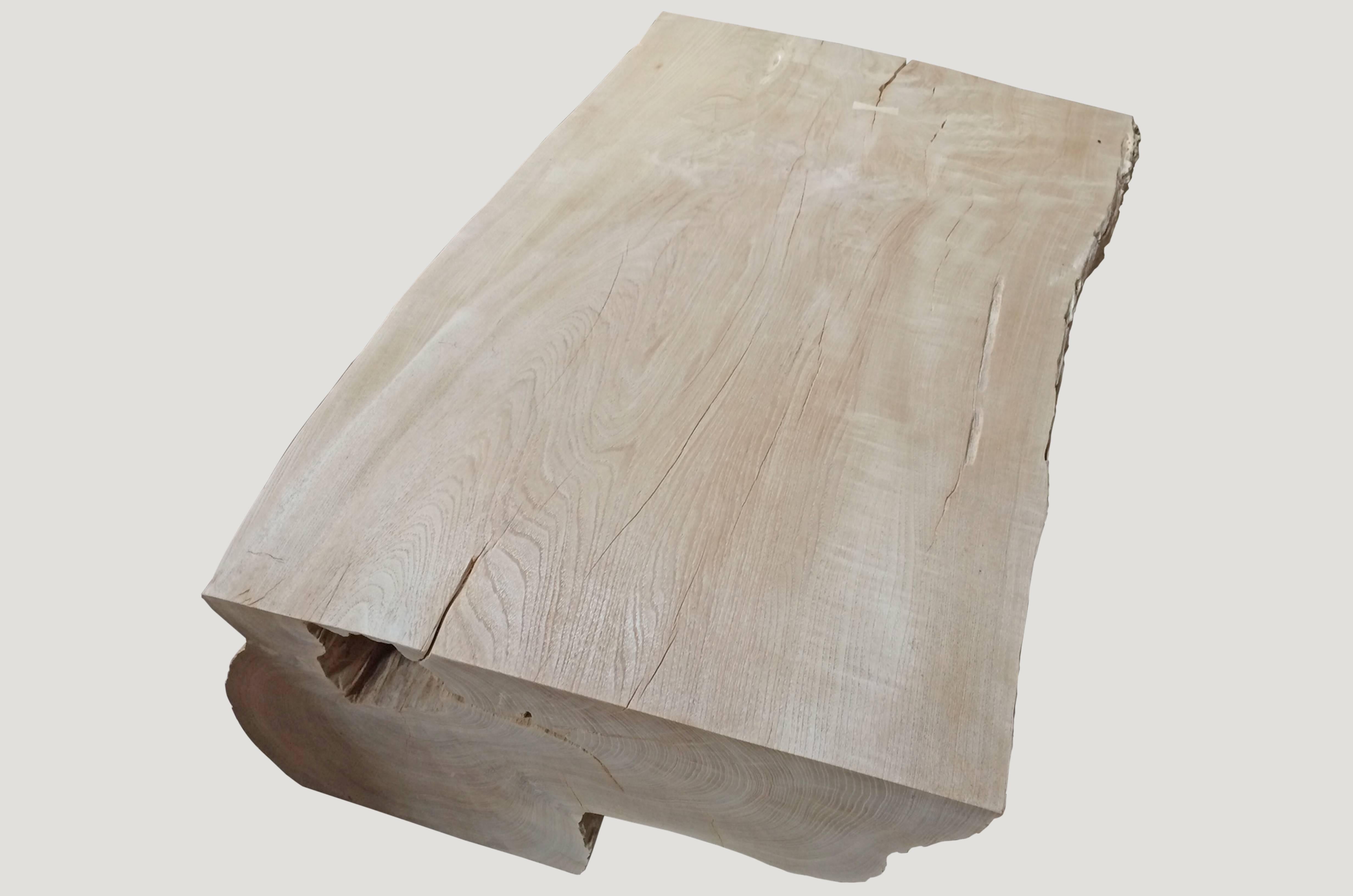 Impressive single slab coffee table made from a hundred year old reclaimed teak root. This stunning teak single slab also features butterfly details. We have added a light shellack on the top section. Organic is the new modern.

The St. Barts