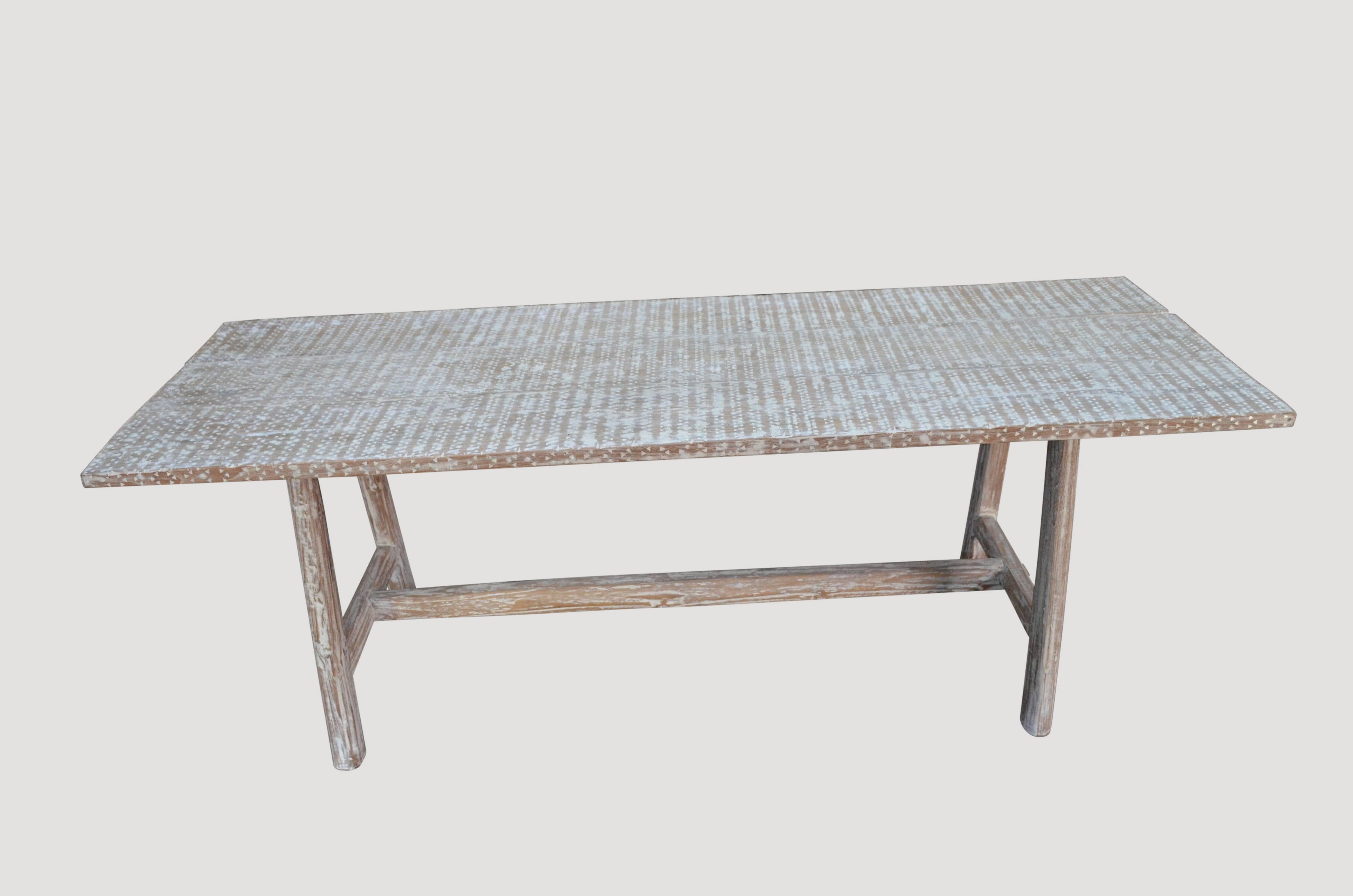 Reclaimed teak wood dining table with a white wash finish and full shell inlay top.

Custom sizes available.

Andrianna Shamaris. The Leader In Modern Organic Design™