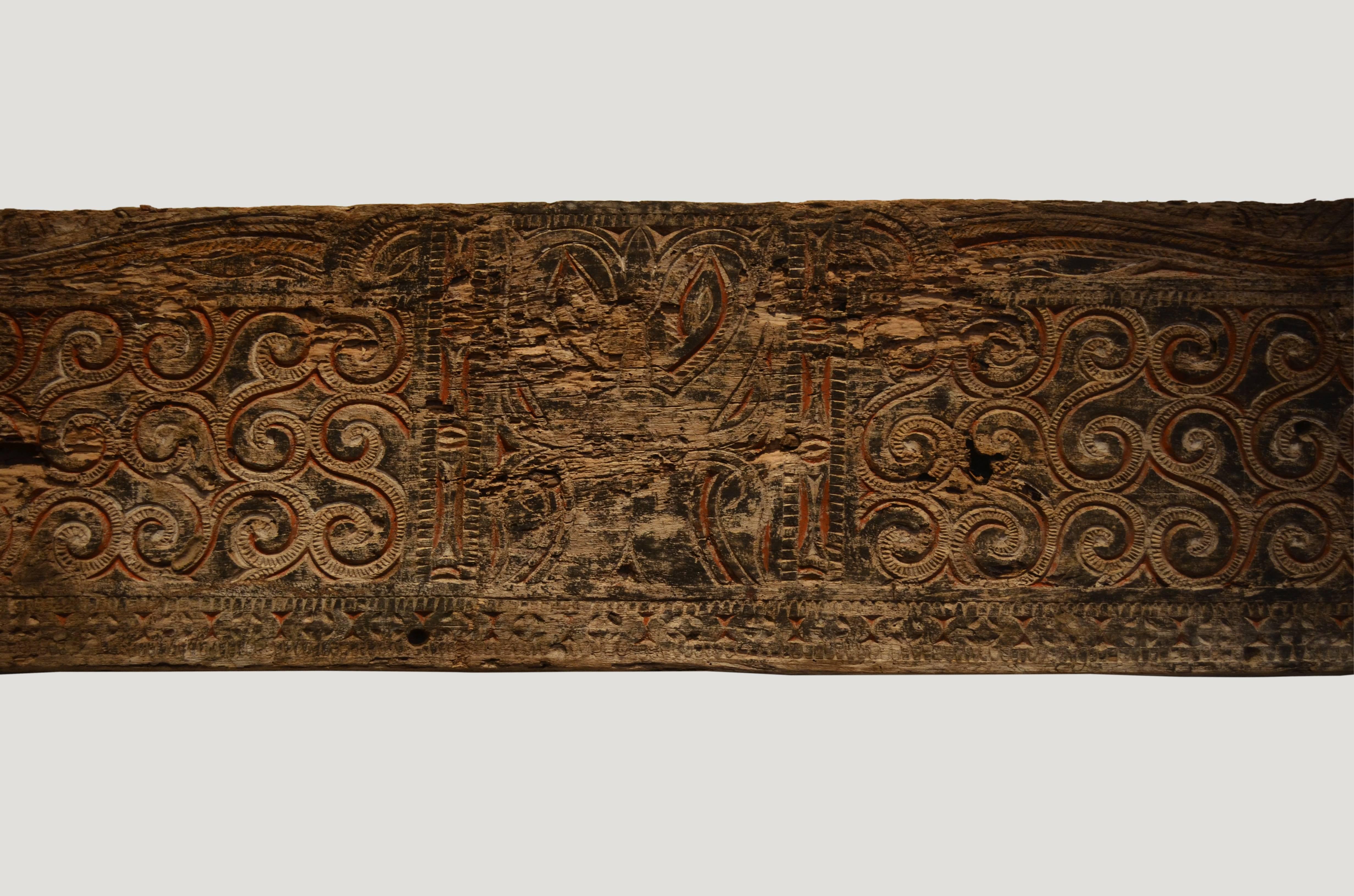 Andrianna Shamaris hand-carved architectural panel from Toraja. The carving symbolizes peace and happiness. Originally used as an exterior panel.

Andrianna Shamaris, Inc. The Leader In Modern Organic Design™
