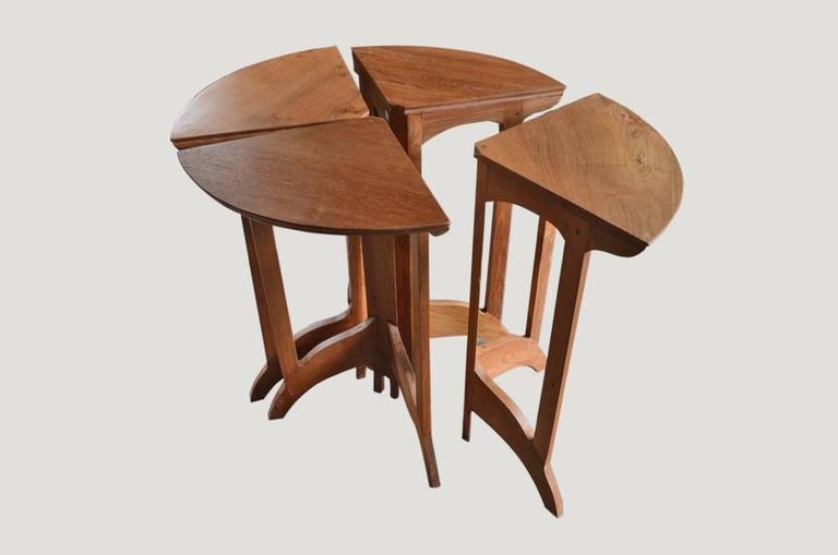 Art Deco teak wood side table in four sections. Total diameter when placed together is 29.5