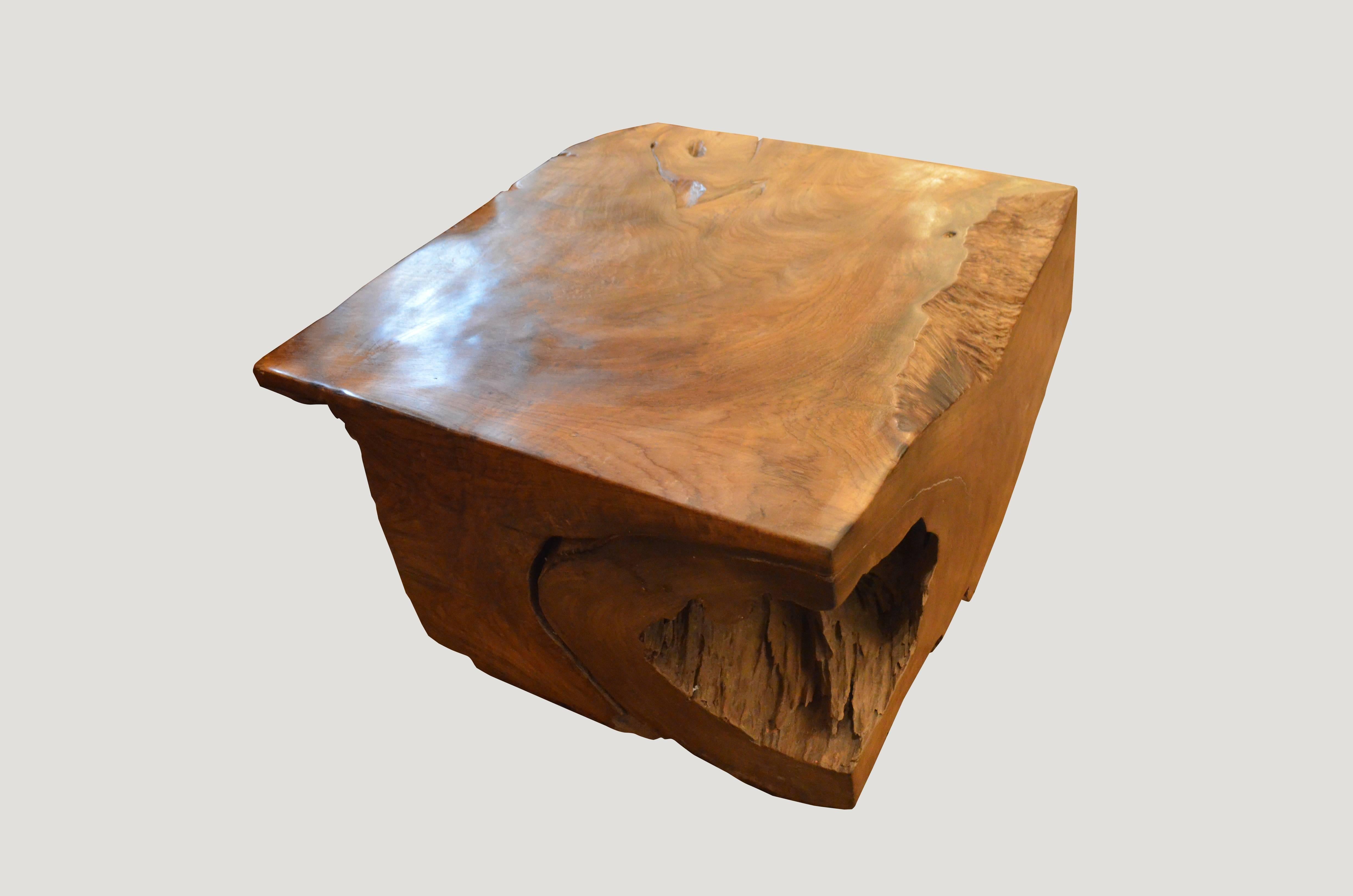 Stunning patina on this single reclaimed teak wooden root coffee table.

This coffee table was sourced in the spirit of wabi-wabi, a Japanese philosophy that beauty can be found in imperfection and impermanence. It’s a beauty of things modest and