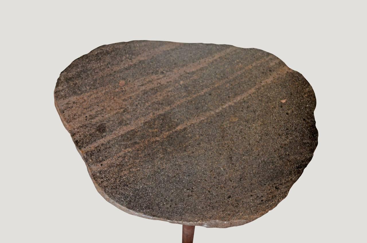 River stone top from the Ayung River on the Indonesian island of Bali. We added antiqued metal legs. Perfect for inside of outside living.

Andrianna Shamaris. The Leader In Modern Organic Design™