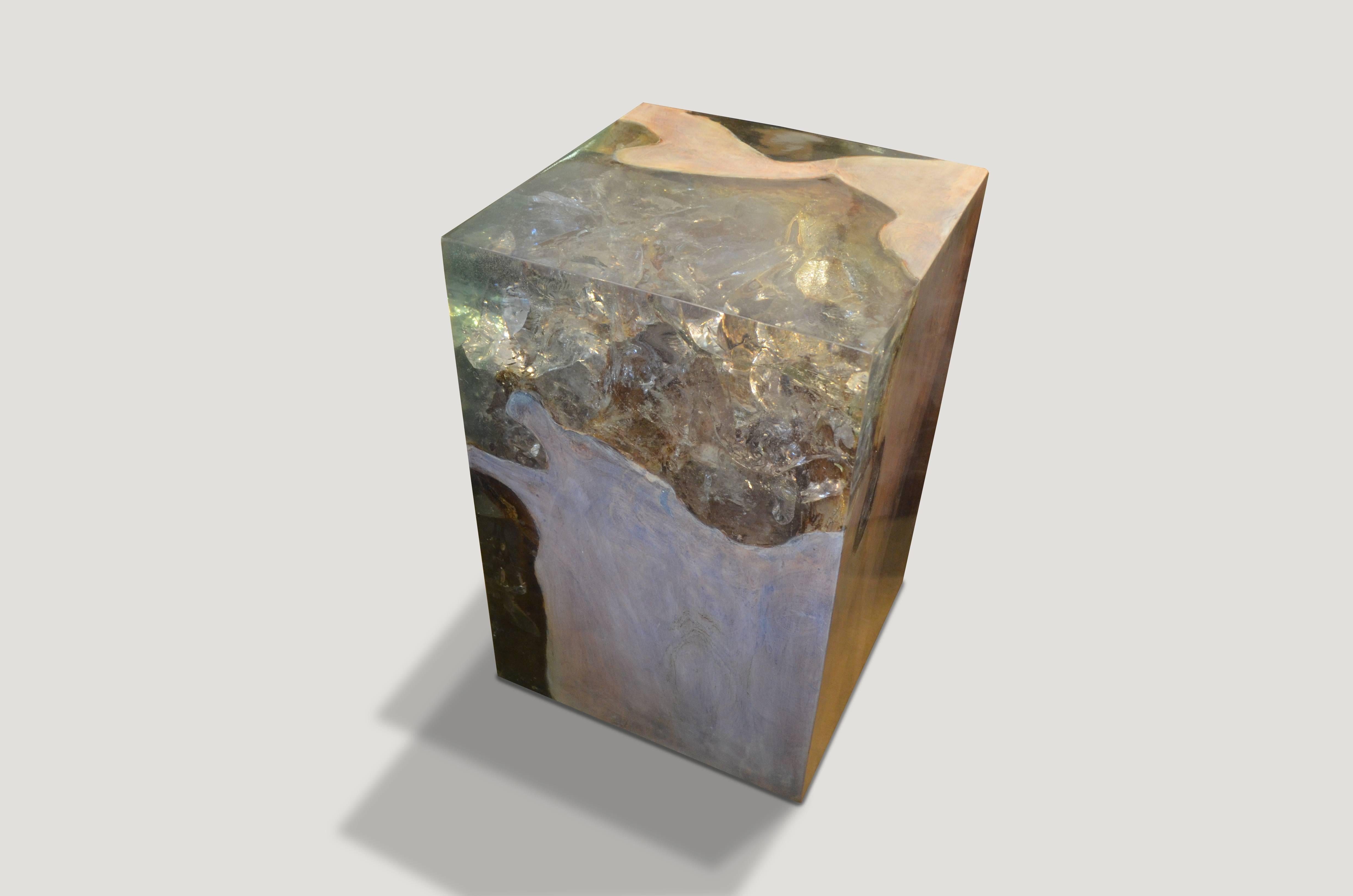 The St. Barts side table is a unique variation of the teak wood and cracked resin cube. Ice blue or aqua resin is cracked and added into the natural grooves of the bleached teak wood, sanded and finished with a high polish.

The St. Barts collection
