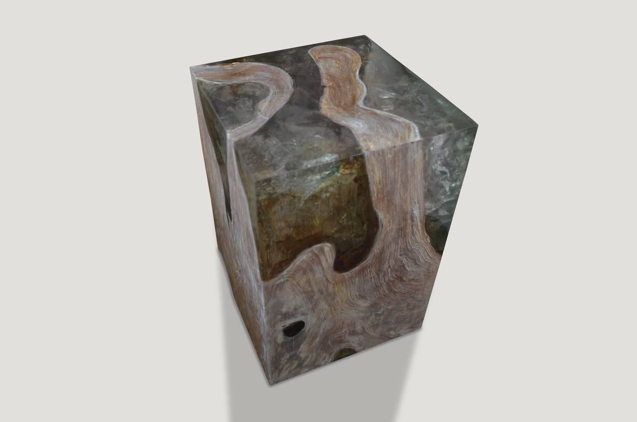 The St. Barts side table is a unique variation of the teak wood and cracked resin cube. Ice blue or aqua resin is cracked and added into the natural grooves of the bleached teak wood, sanded with a cerused finish.

The St. Barts collection features