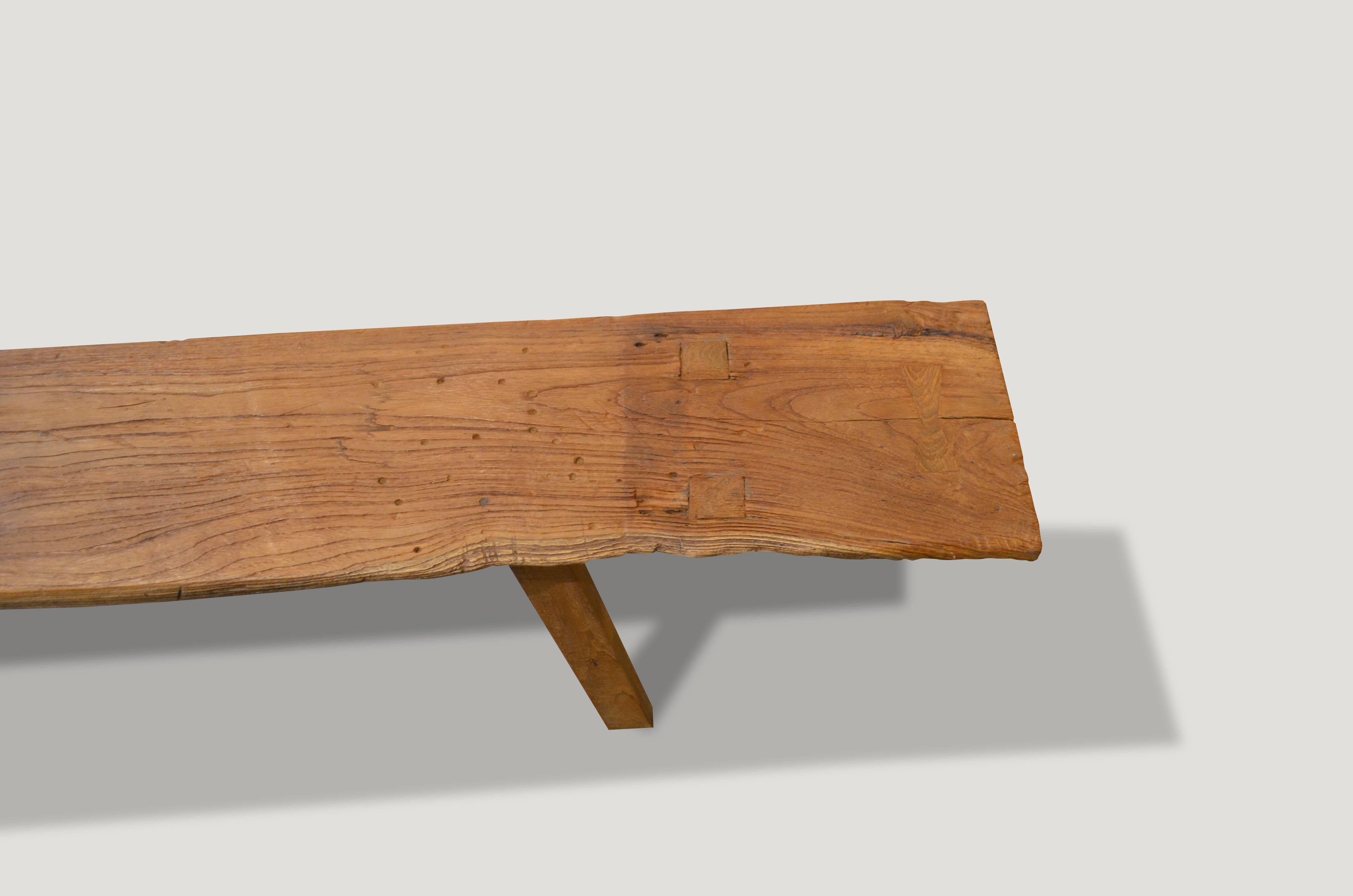 Antique single slab bench or coffee table with beautiful patina and added butterfly detail. Can also be used as a shelf.

This bench was sourced in the spirit of wabi-sabi, a Japanese philosophy that beauty can be found in imperfection and