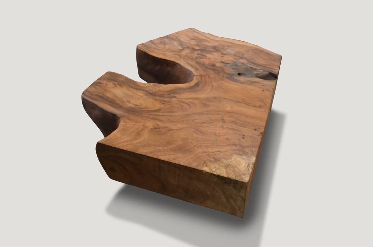 Single slab, reclaimed suar wood coffee table with an impressive 8” thick top. The organic shaped top floats on a modern base. Organic is the new modern.

Andrianna Shamaris, Inc. The Leader In Modern Organic Design™