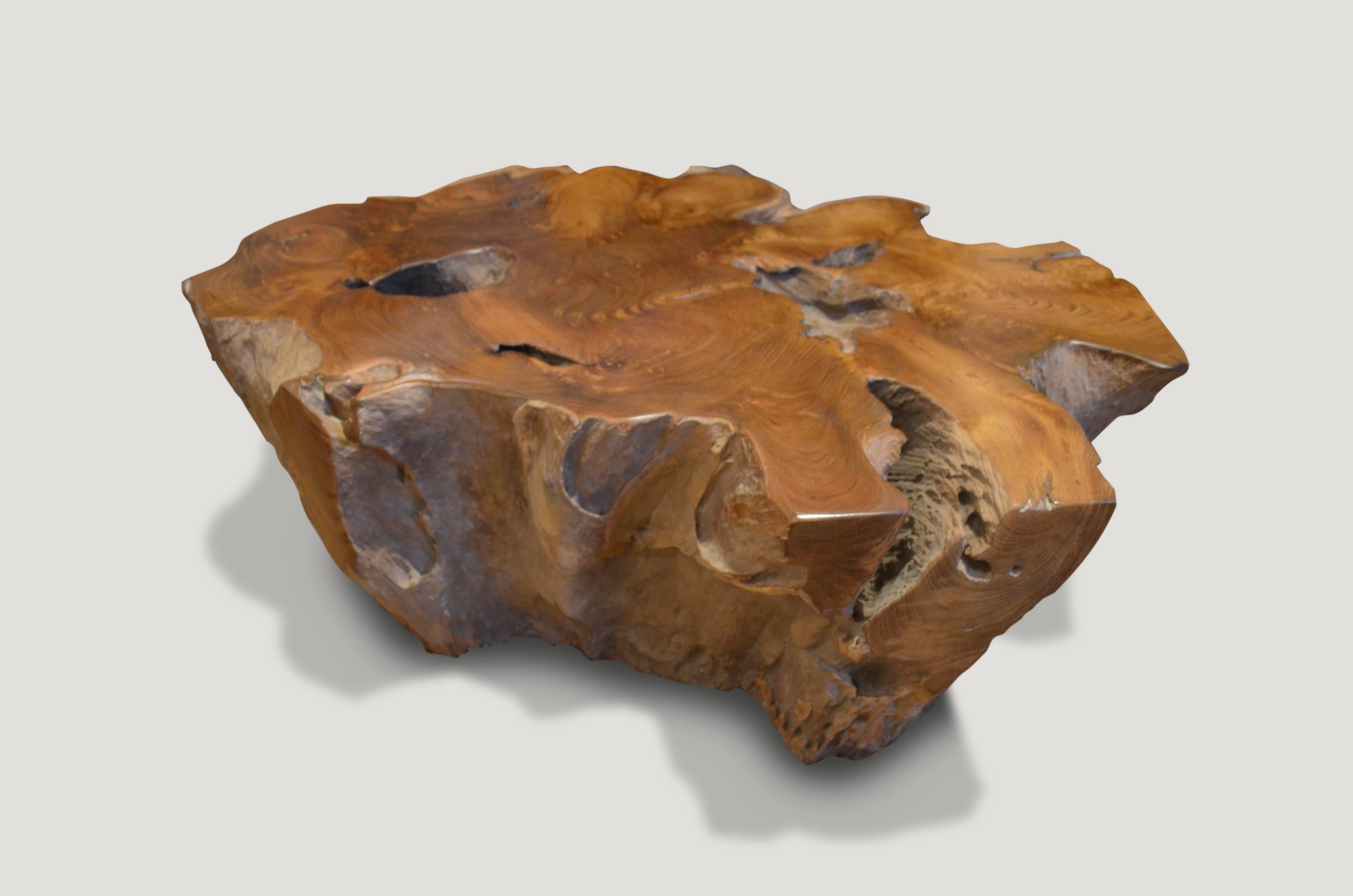 Reclaimed teak wood single root coffee table or side table. We have polished the top to enhance the wood grain and left the sides raw in contrast.

Andrianna Shamaris, Inc. The Leader In Modern Organic Design