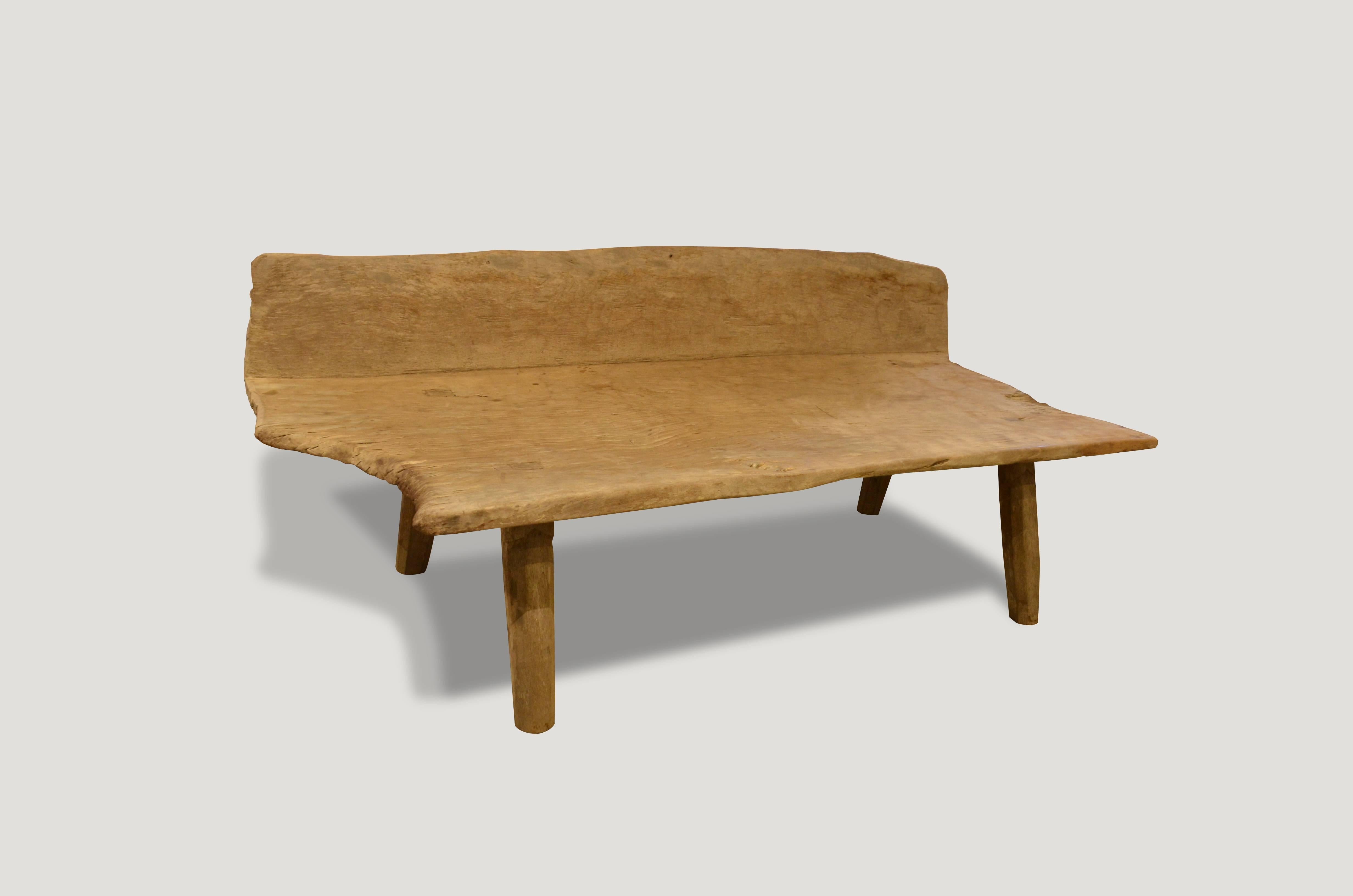 For the Primitive collector. This stunning bench has been hand-carved from a single teak wood root from the island Madura. Though it is Primitive there are beautiful, unexpected, hand-carved bevelled legs. Rare.

This bench was sourced in the spirit