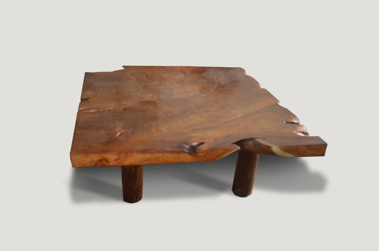 Impressive single slab reclaimed teak wood coffee table, floating on Minimalist style legs. Organic is the new modern.

Measures: 40 x 39 x 16