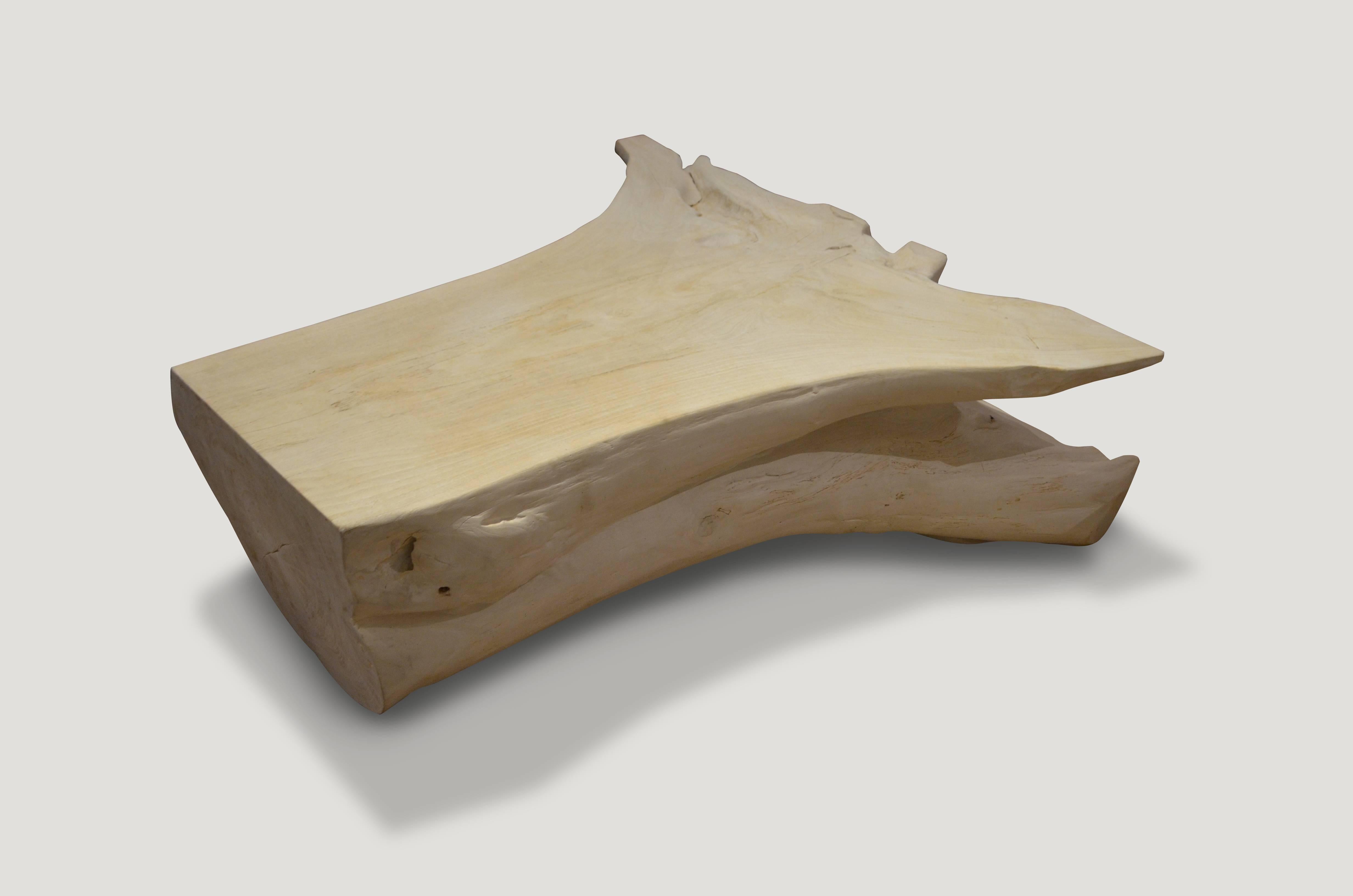 Impressive single root, reclaimed bleached teak wood coffee table.

The St. Barts collection features an exciting new line of organic white wash and natural weathered teak furniture. The reclaimed teak is left to bake in the sun and sea salt air for