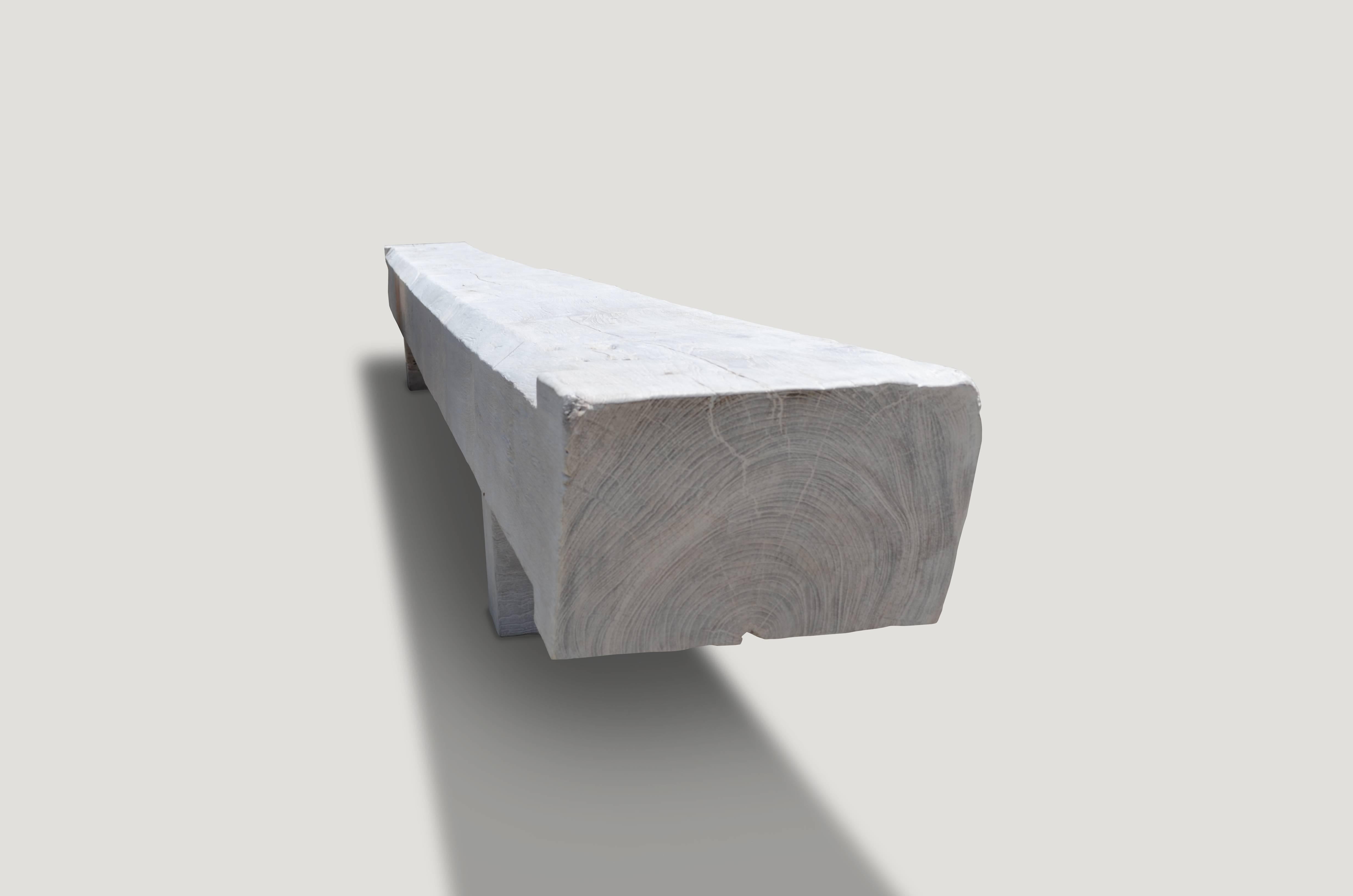 Impressive reclaimed bleached teak wood log bench with a light white washed finish. The hand carved top rests on a modern teak base. Perfect for inside or outside living.

The St. Barts collection features an exciting new line of organic white wash