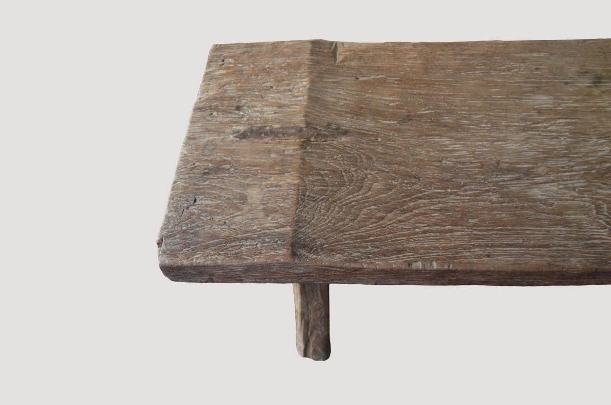 Antique bench or coffee table carved from a single 16.5″ wide teak slab.

This bench or coffee table was sourced in the spirit of wabi-sabi, a Japanese philosophy that beauty can be found in imperfection and impermanence. It’s a beauty of things