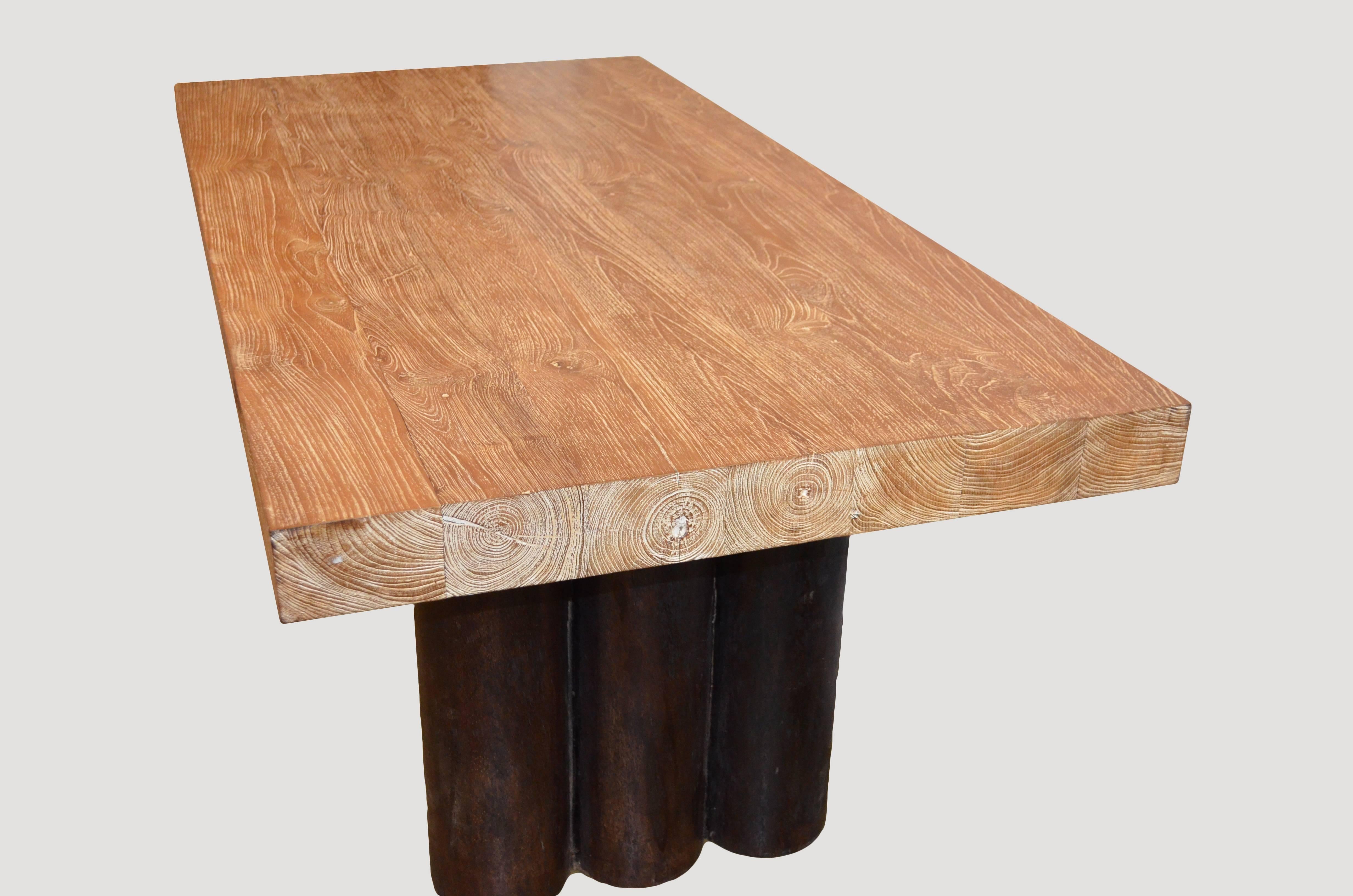 This four inch thick teak cerused top rests on a contrasting hollowed out coconut base stained espresso.

Own an Andrianna Shamaris original.

Andrianna Shamaris. The Leader In Modern Organic Design™