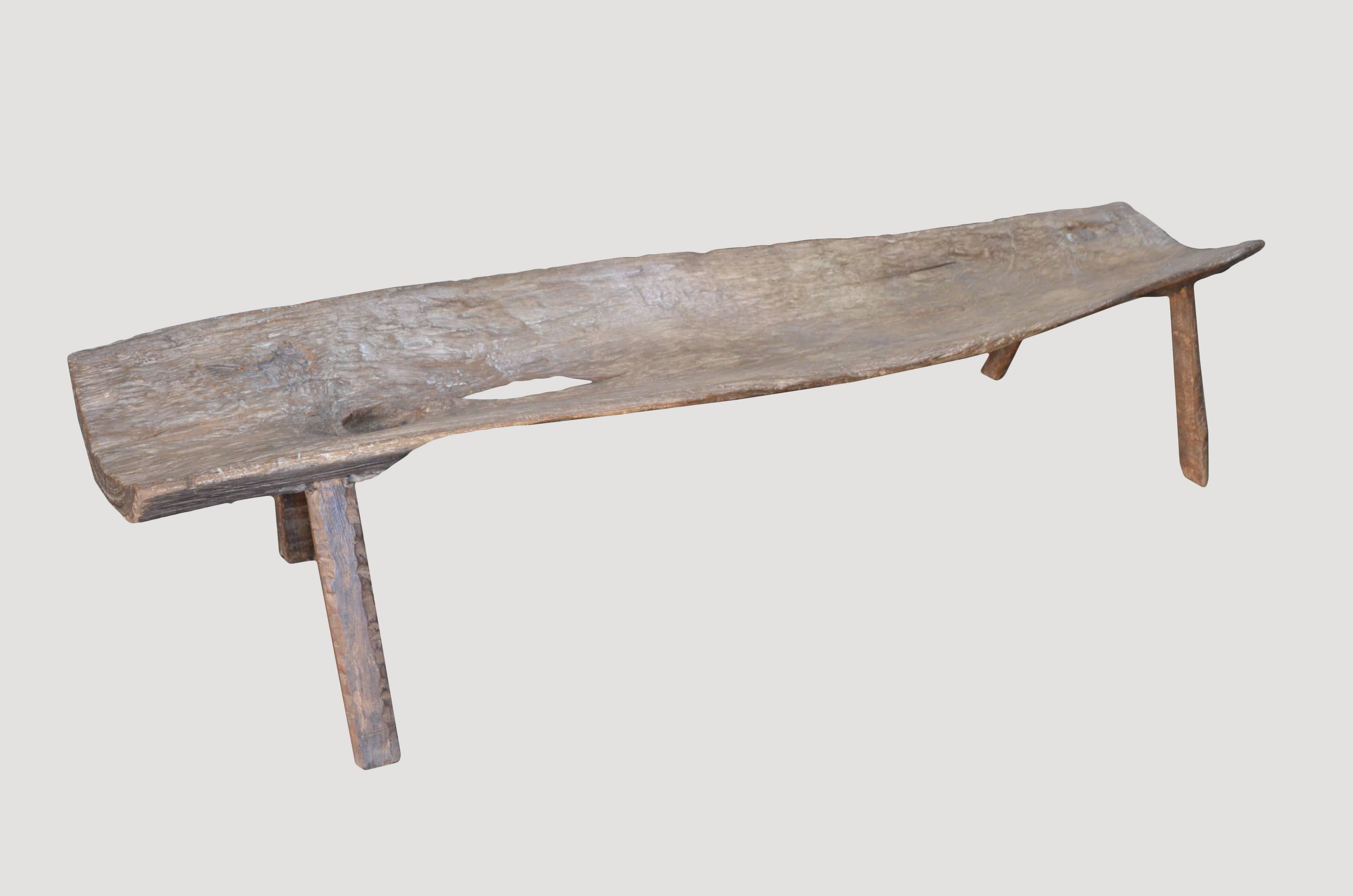 Antique bench with beautiful patina carved from a single 16