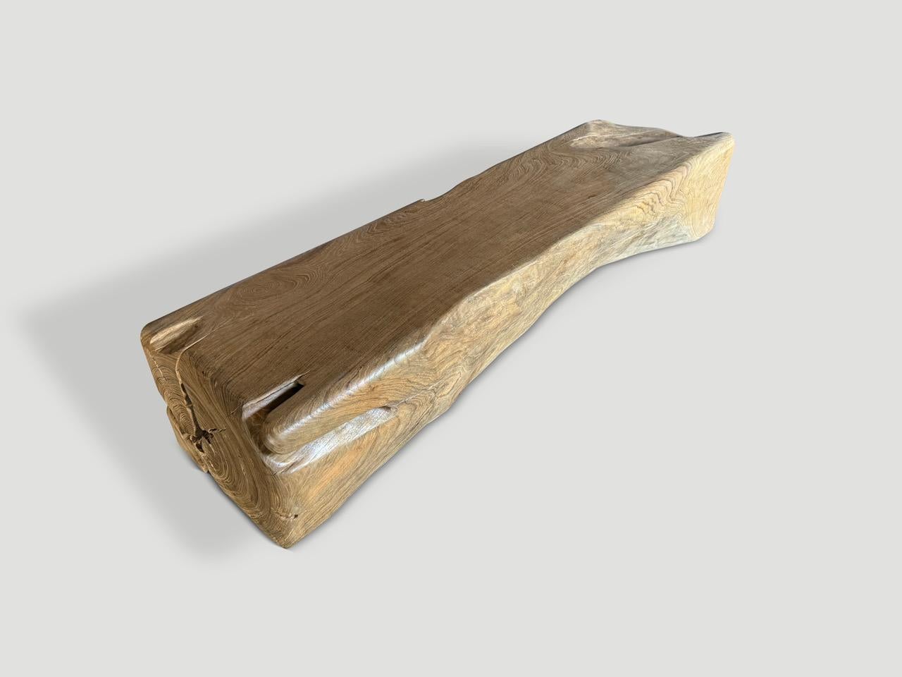 Impressive patina on this ancient teak wood. We nursed this beautiful 200 year old log back to life and hand carved to produce this one of a kind bench. Finished with a natural oil revealing the unique wood grain. It’s all in the details. Both