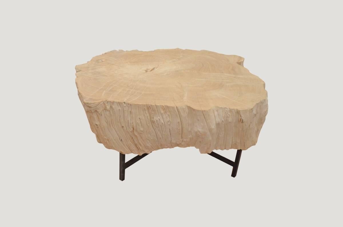 Beautiful erosion teak wood coffee table floating on a steel base. Carved from a single root, 10" thick. A light shellack has been added to the top.

The St. Barts collection features an exciting new line of organic white wash and natural