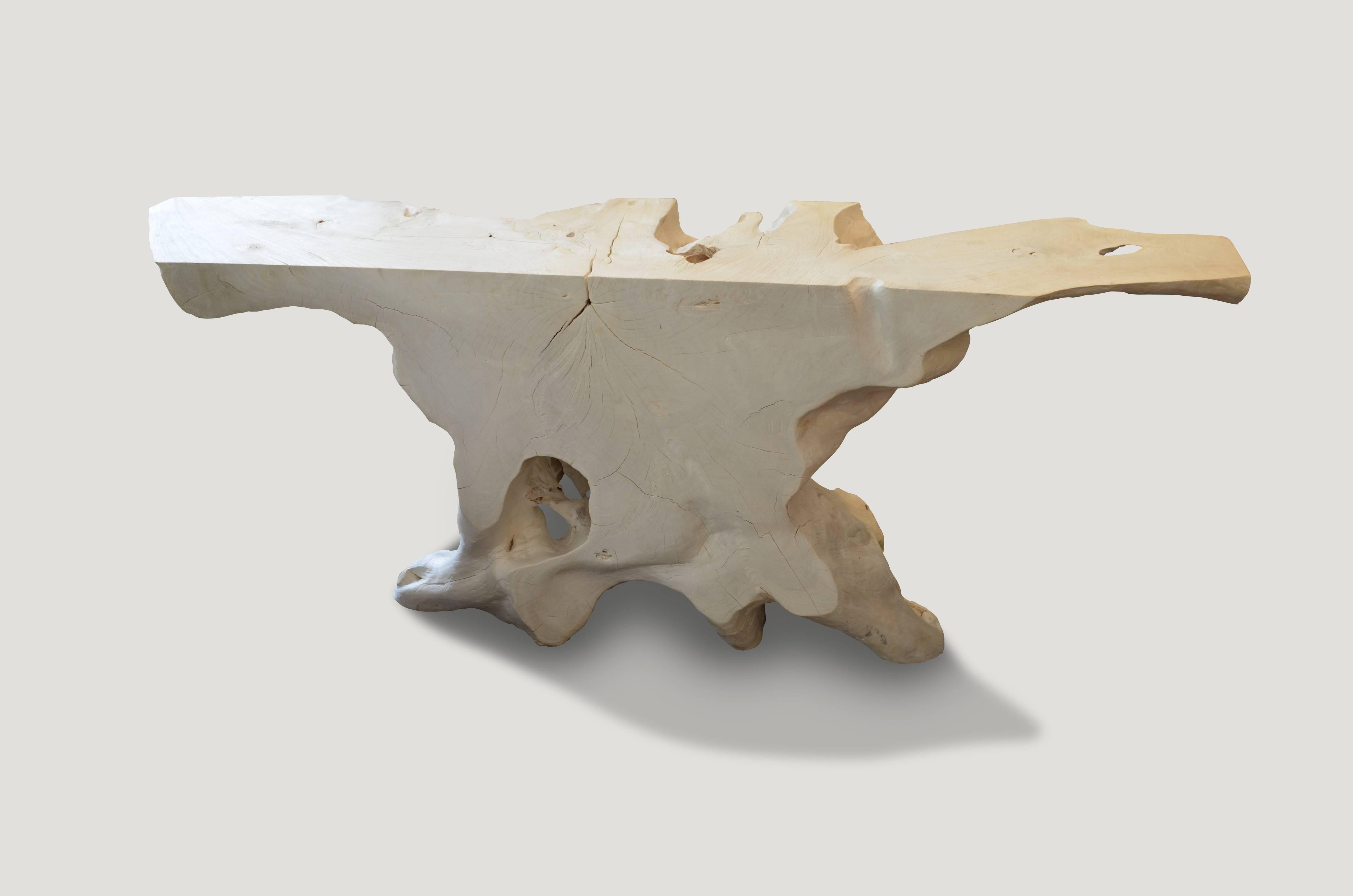 Natural organic formed console or coffee table made from a hundred year old reclaimed teak wood root. Fabulous on both sides. Glass or Lucite can be added on the top section. Organic is the new modern. 80 x 16 x 30.5