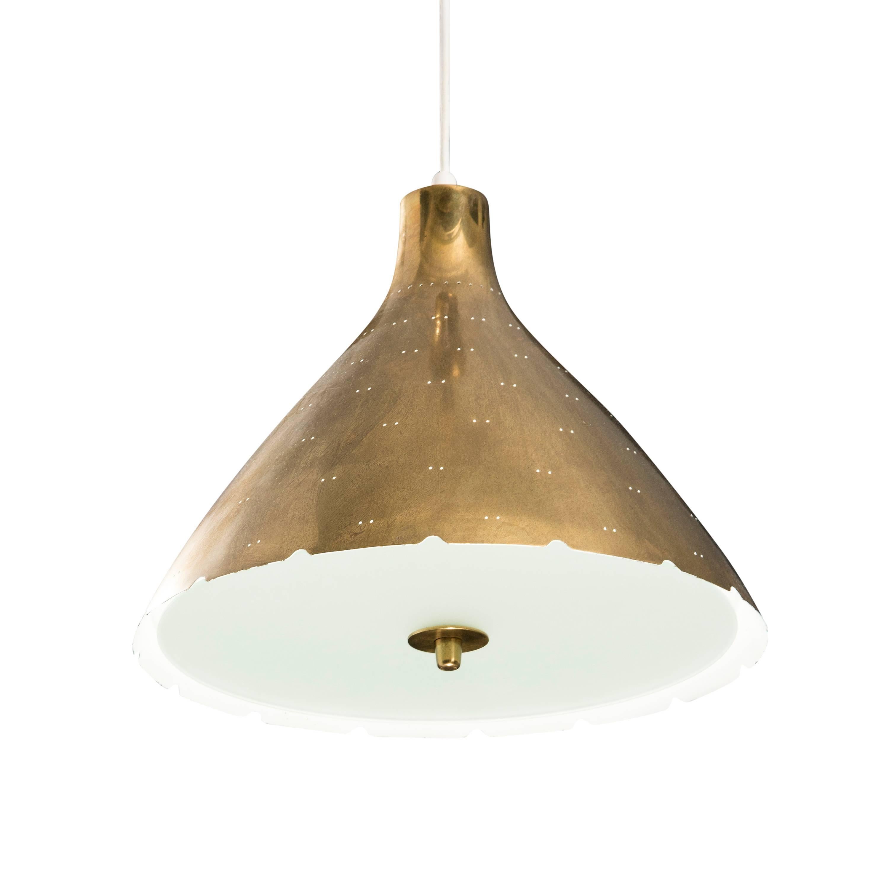 Paavo Tynell ceiling lamp. Brass and frosted glass. Designed for Taito Oy in the 1940s.