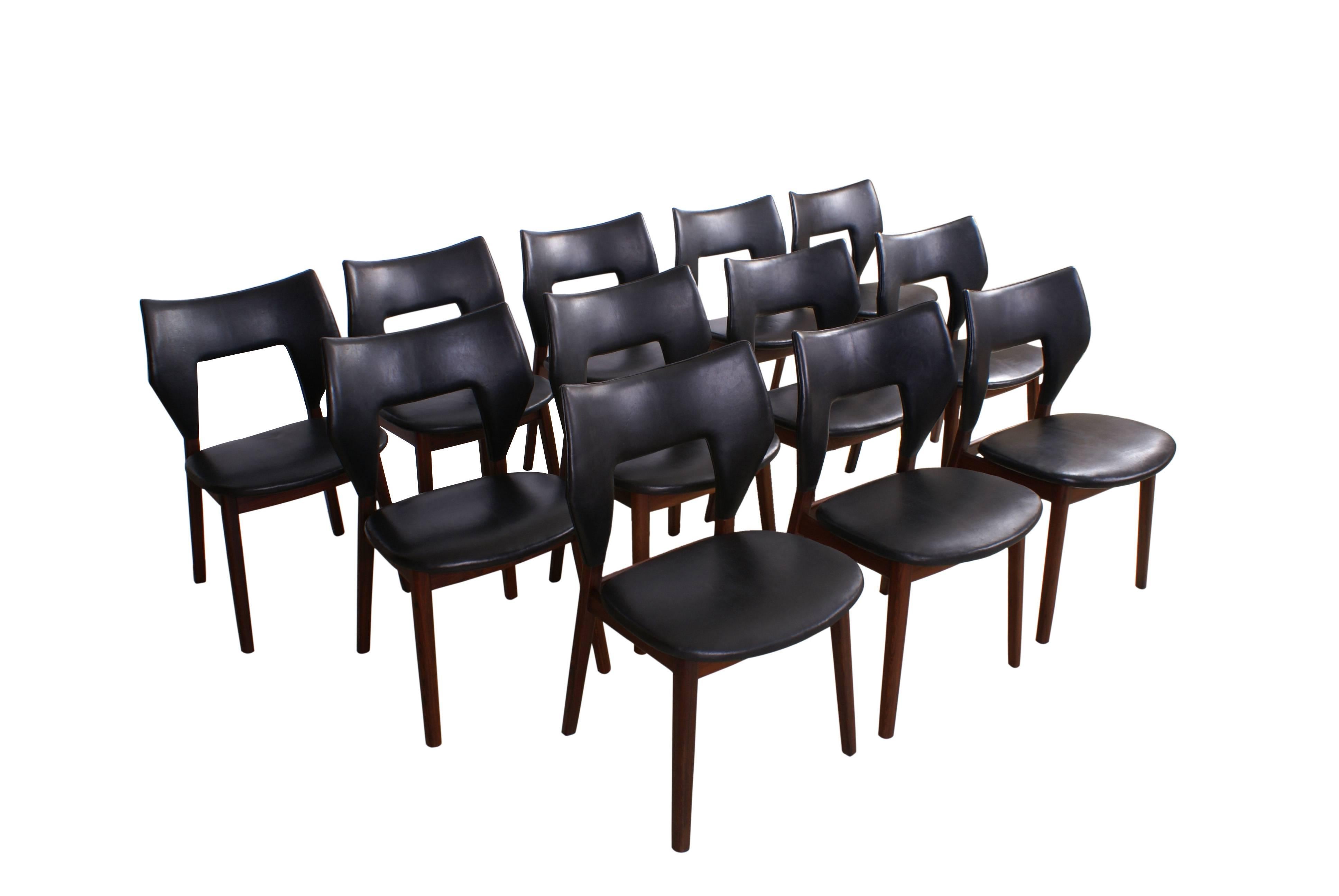 Tove & Edvard Kindt-Larsen, set of 12 sculptural dining Chairs in Brazilian rosewood and black leather. Designed 1960.

All chairs with metal plaque from master cabinetmaker Thorald Madsen.

This is an exceptional and rare set of dining