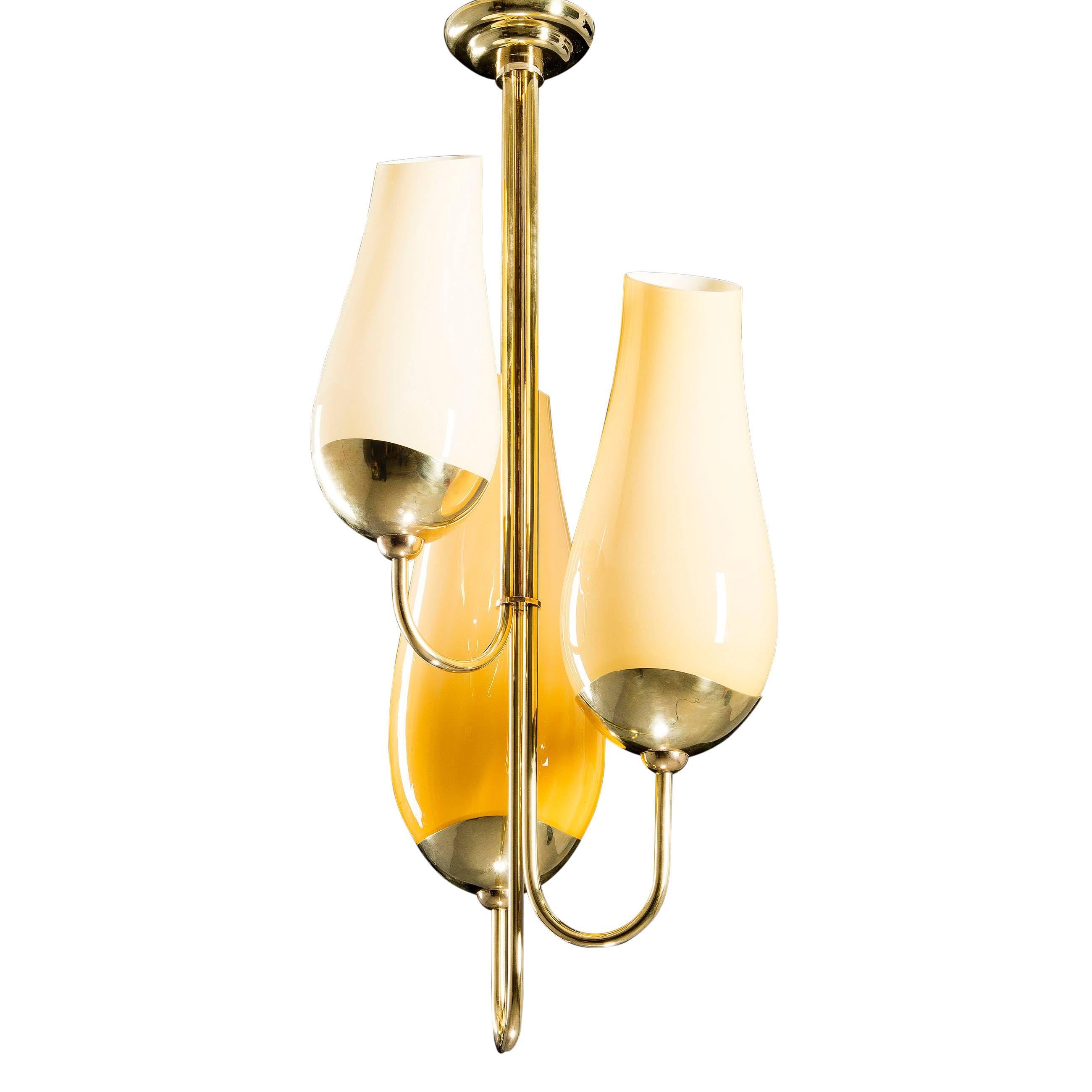 Large Paavo Tynell pendant in brass and glass for Idman, Finland, 1950s. 

Glass has no chips or cracks. The pendant height is 40 inches (100 cm) - height of the glass is 22 inches (55 cm).

Litterature: Similar lamp illustrated in the book