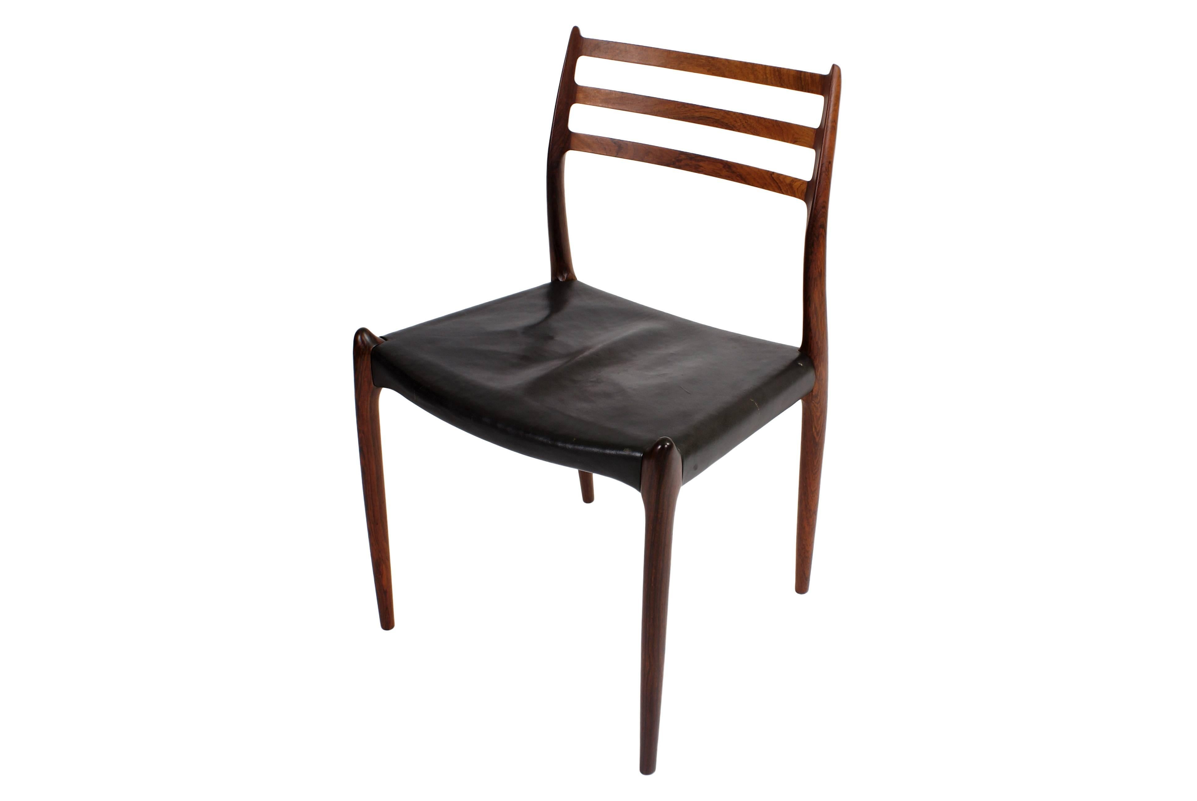 Danish Niels O. Møller Set of Ten Dining Chairs in Rosewood and Black Leather