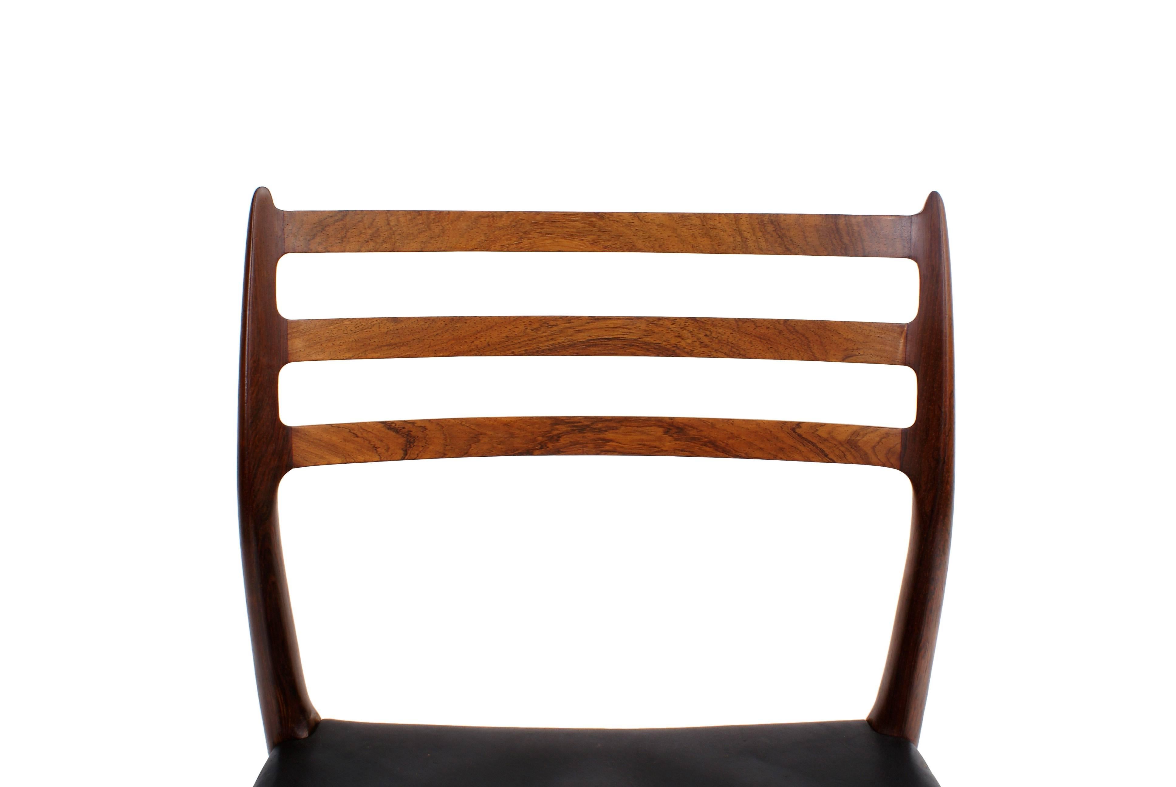 Niels O. Møller Set of Ten Dining Chairs in Rosewood and Black Leather 1
