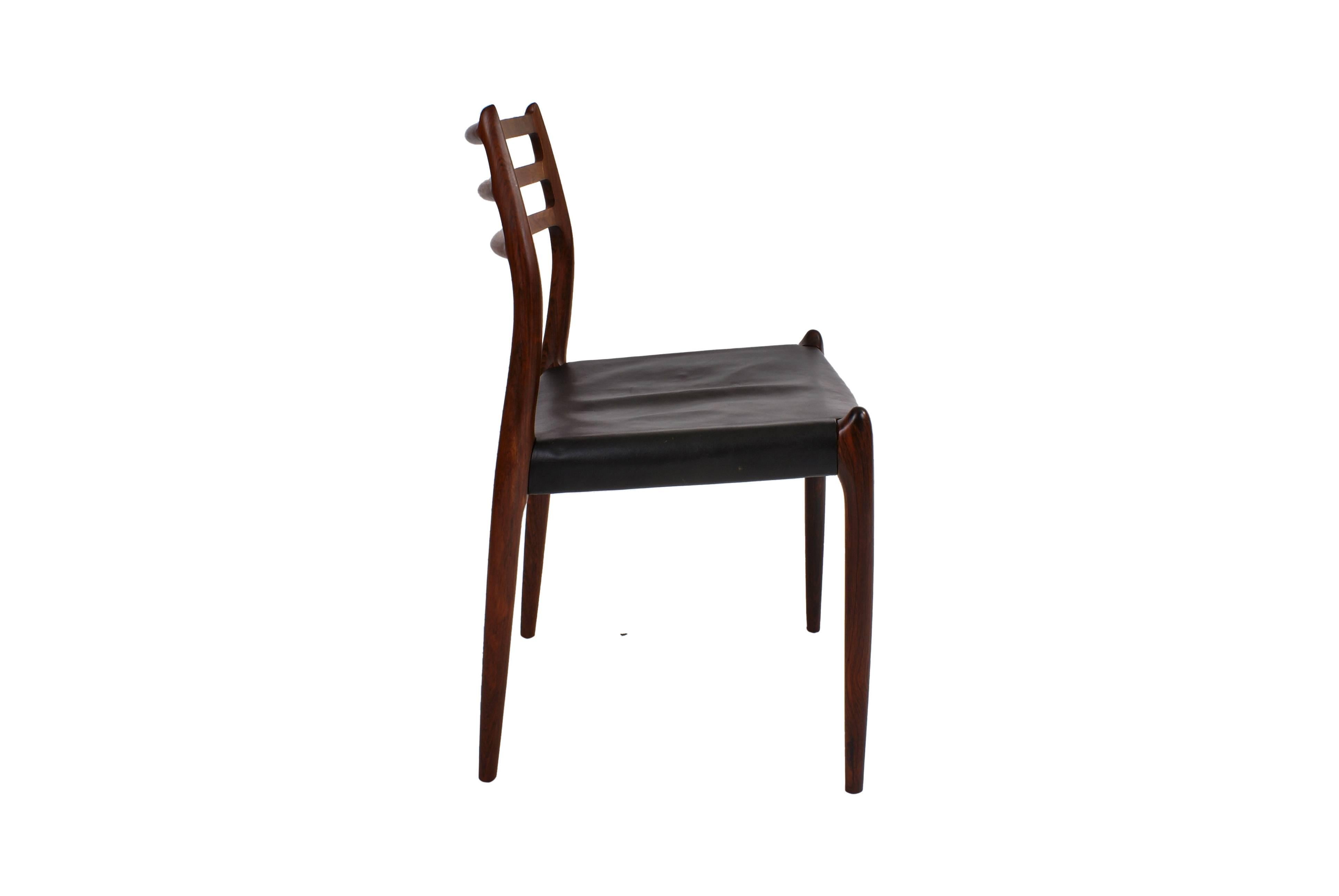 Scandinavian Modern Niels O. Møller Set of Ten Dining Chairs in Rosewood and Black Leather
