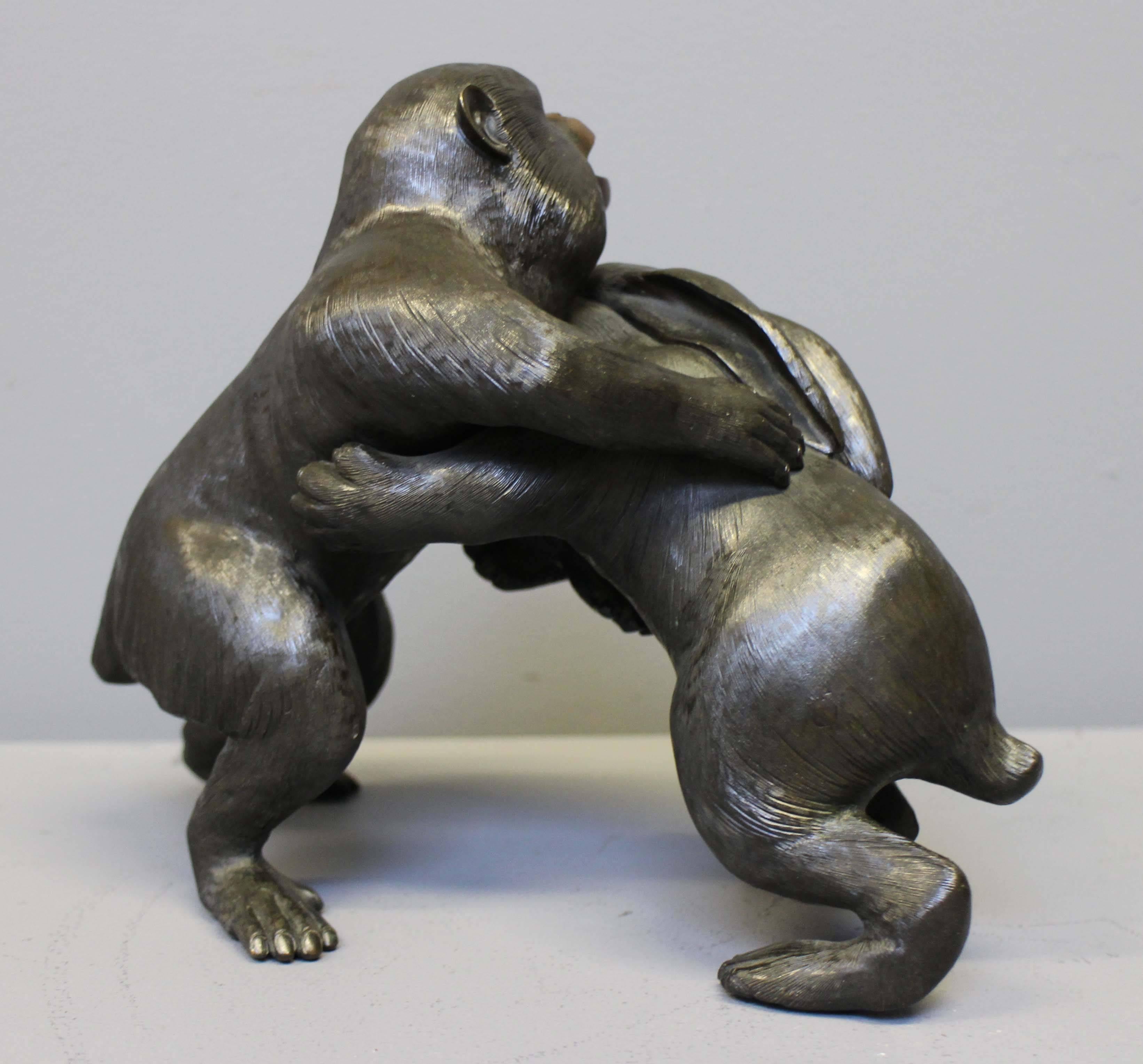 Carved An unusual Antique Japanese Bronze of a Monkey and a Rabbit Wrestling For Sale