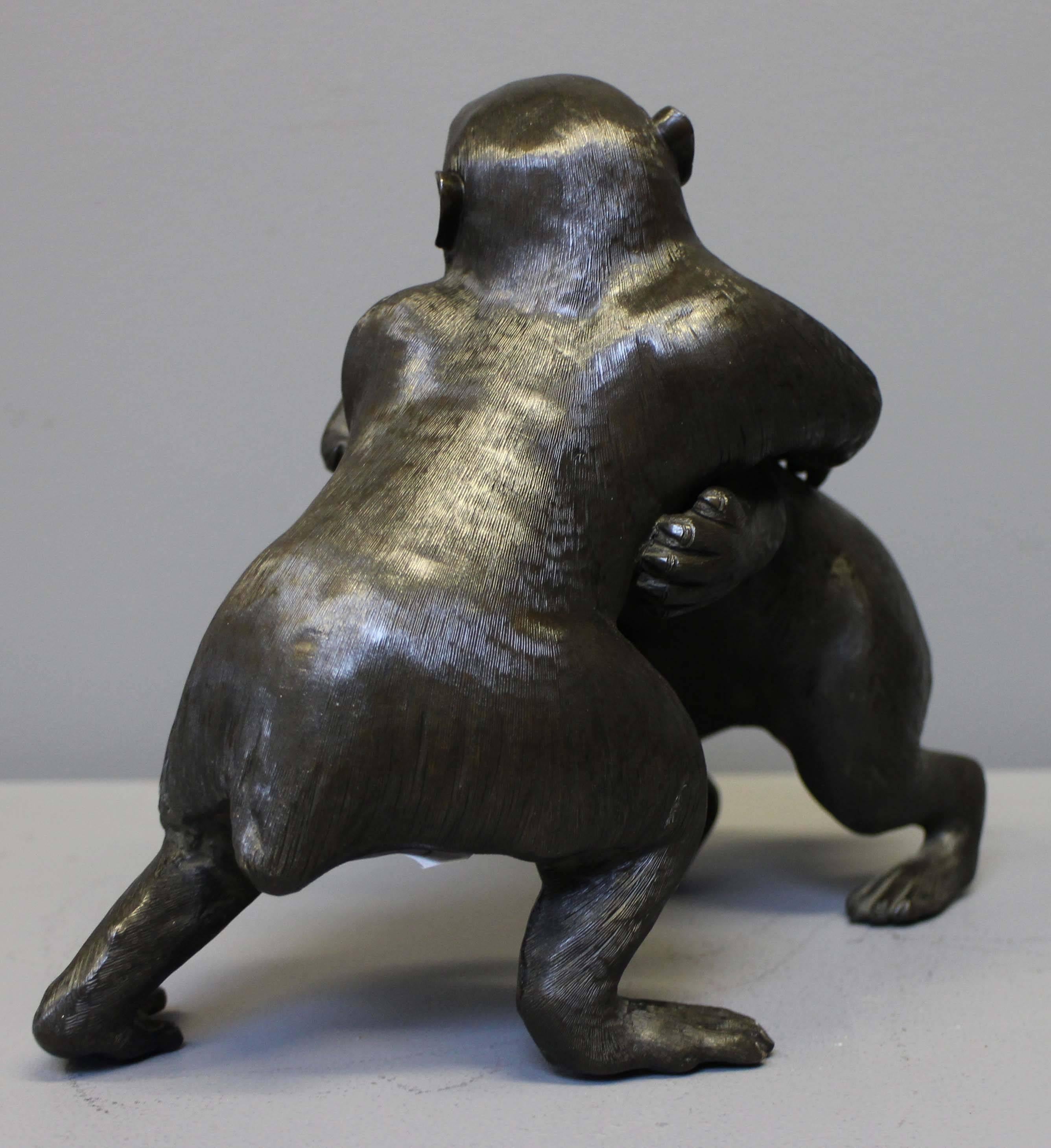 An unusual Antique Japanese Bronze of a Monkey and a Rabbit Wrestling In Excellent Condition For Sale In London, GB