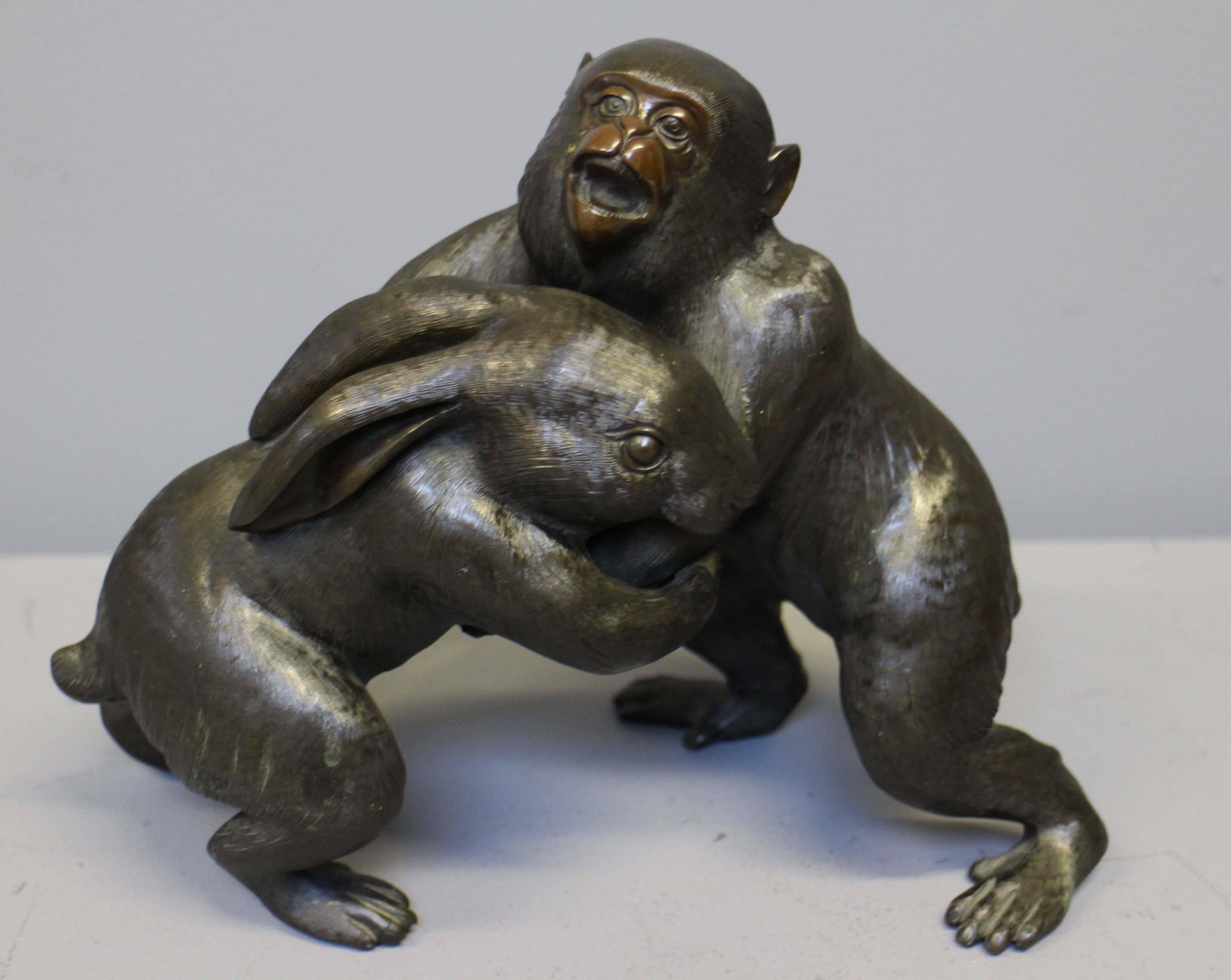 An unusual Antique Japanese Bronze of a Monkey and a Rabbit Wrestling For Sale 1