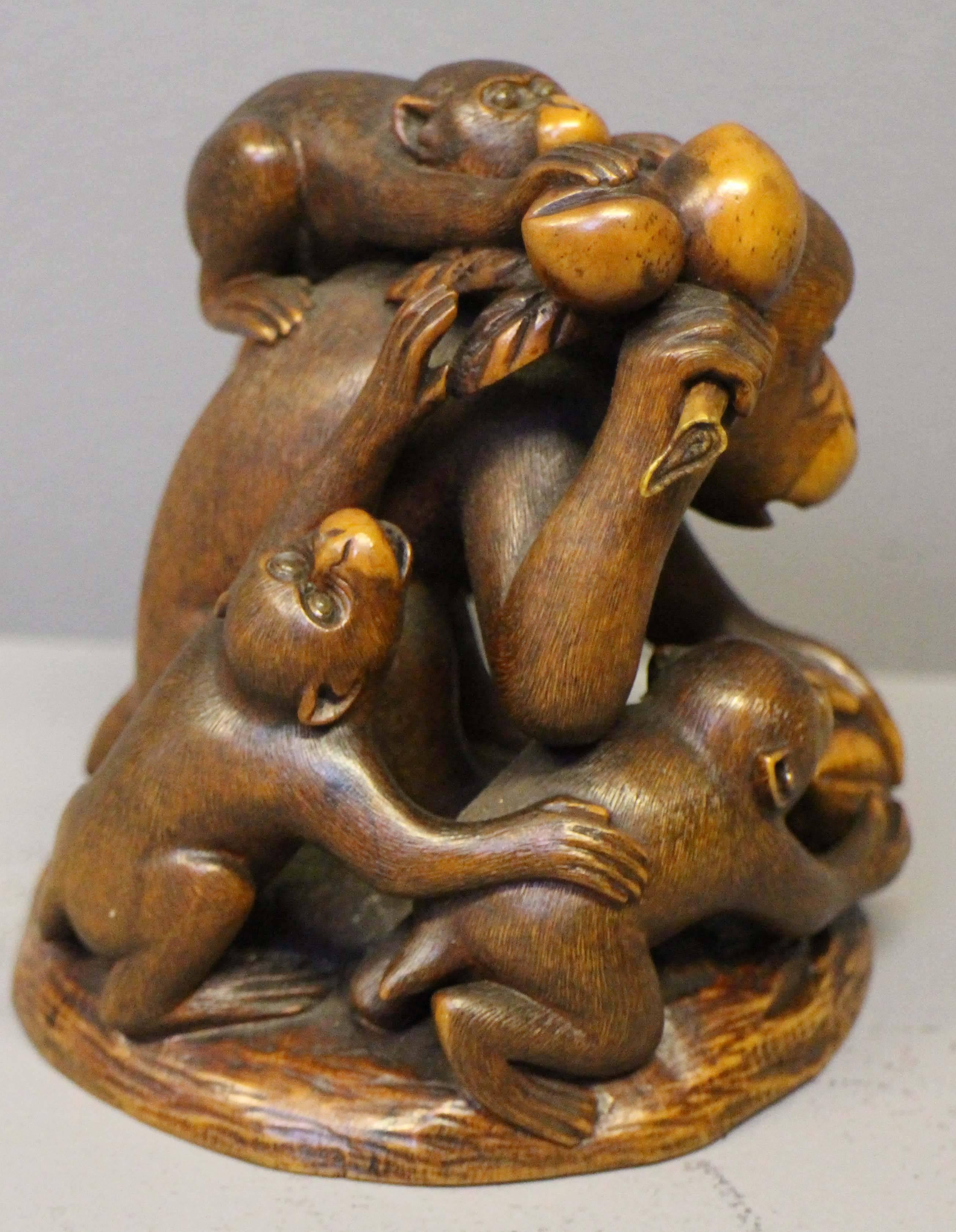 Antique Japanese Carved Wood Okimono of Five Monkeys Eating Peaches In Excellent Condition For Sale In London, GB
