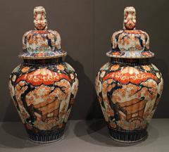 Pair of Antique Japanese Imari Vases and Covers Decorated in Blue and Orange