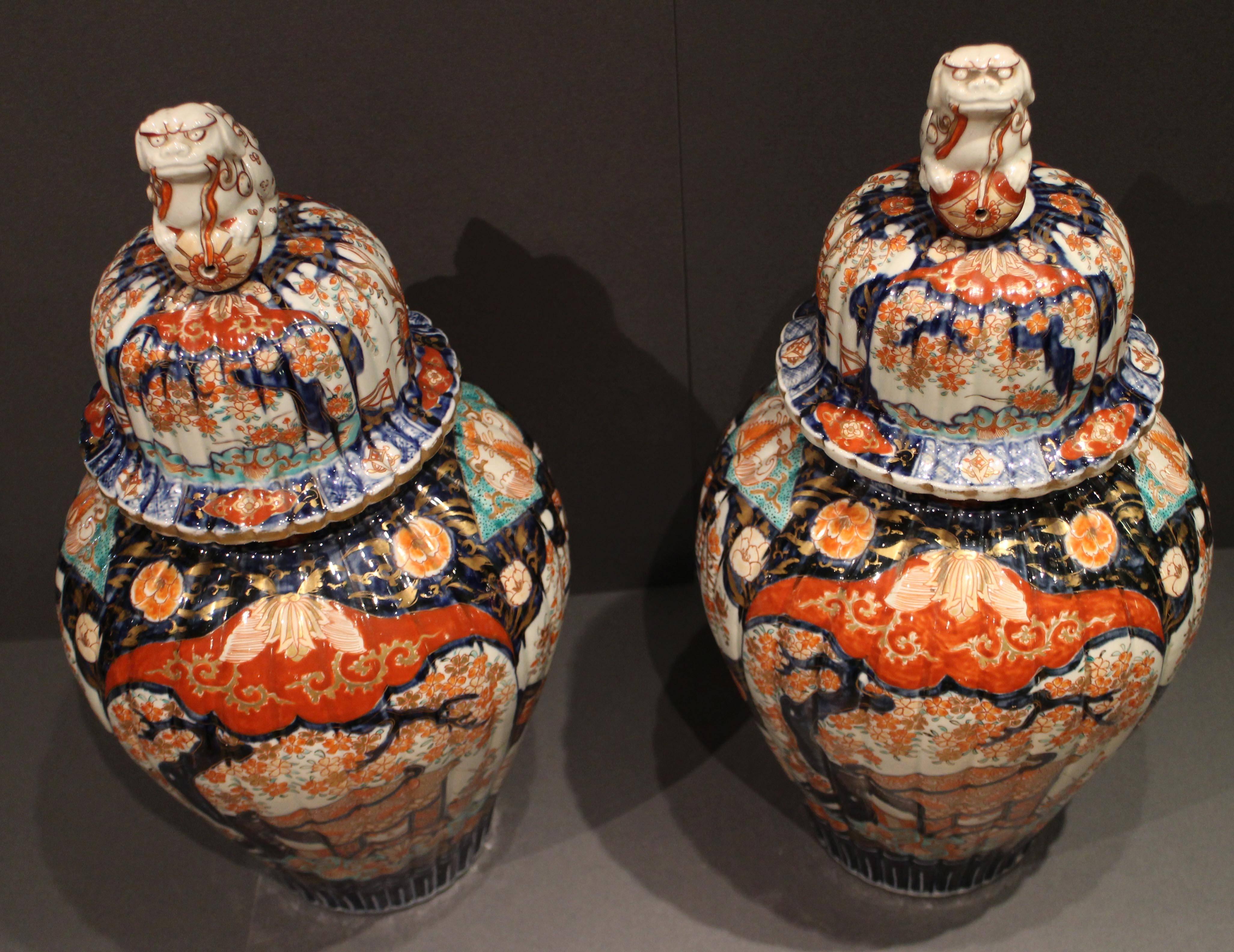 Pair of Antique Japanese Imari Vases and Covers Decorated in Blue and Orange 1