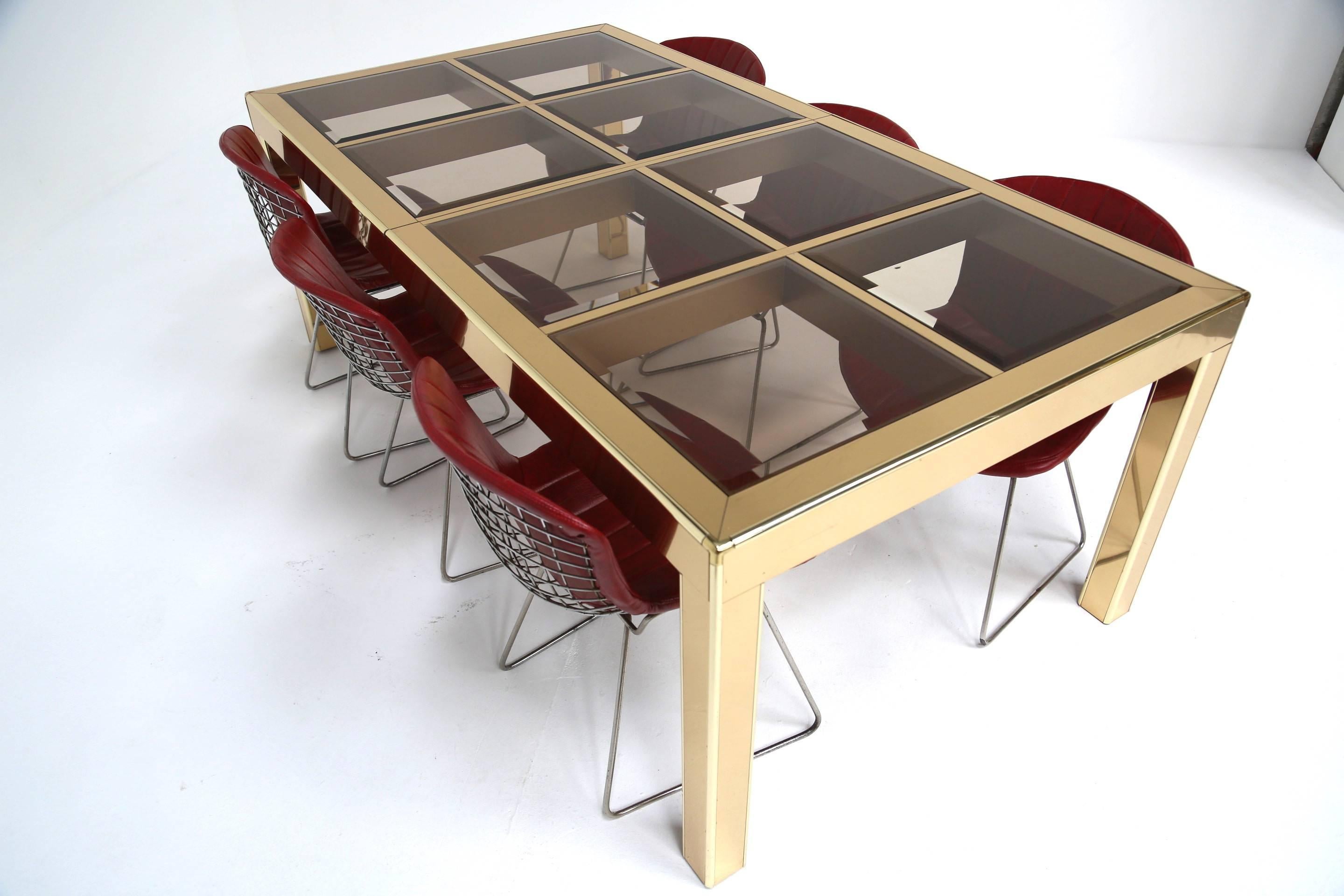 Late 20th Century Mastercraft brass and glass mid century extending dining table. For Sale