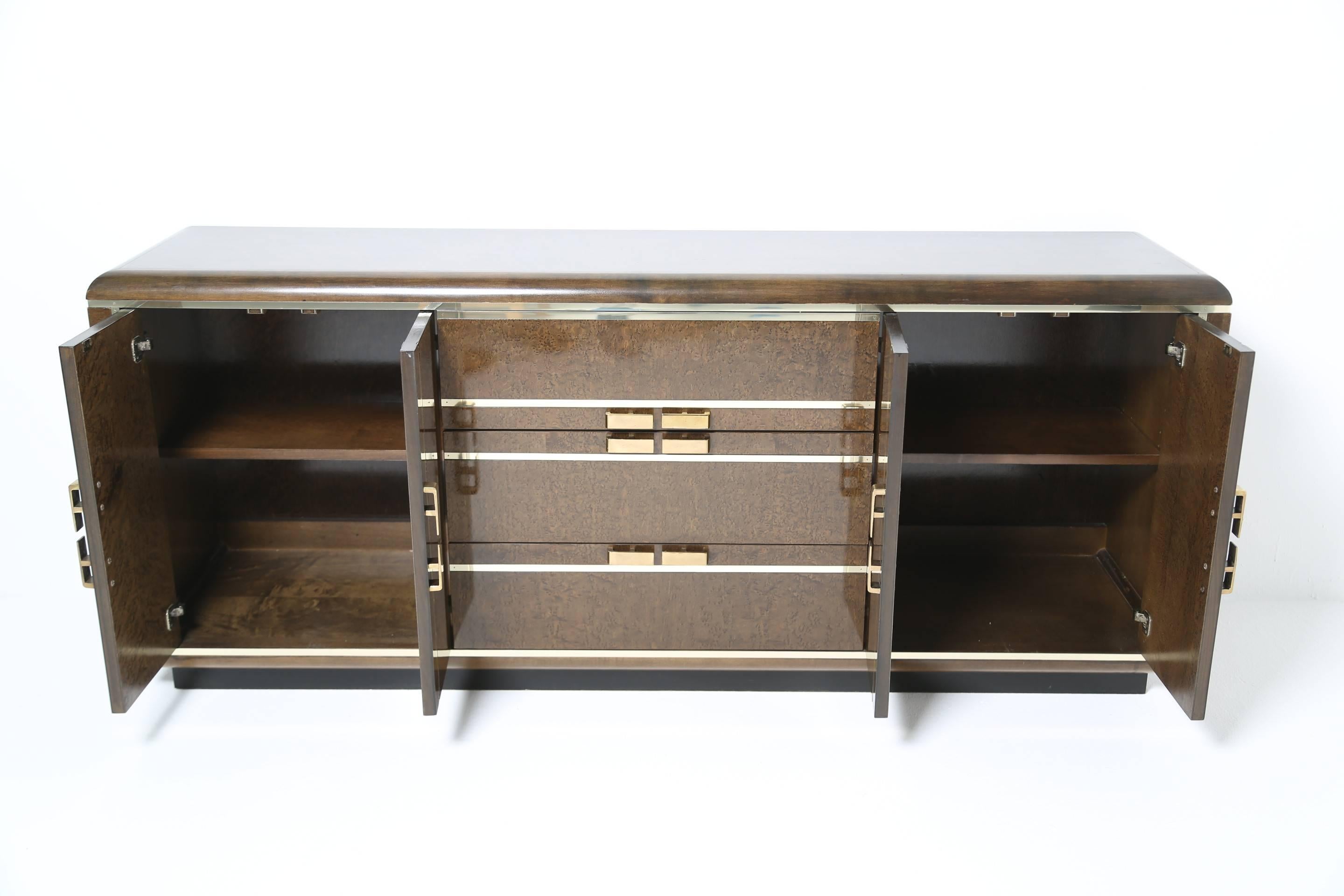 American Romweber burlwood and brass sideboard in an art deco style.