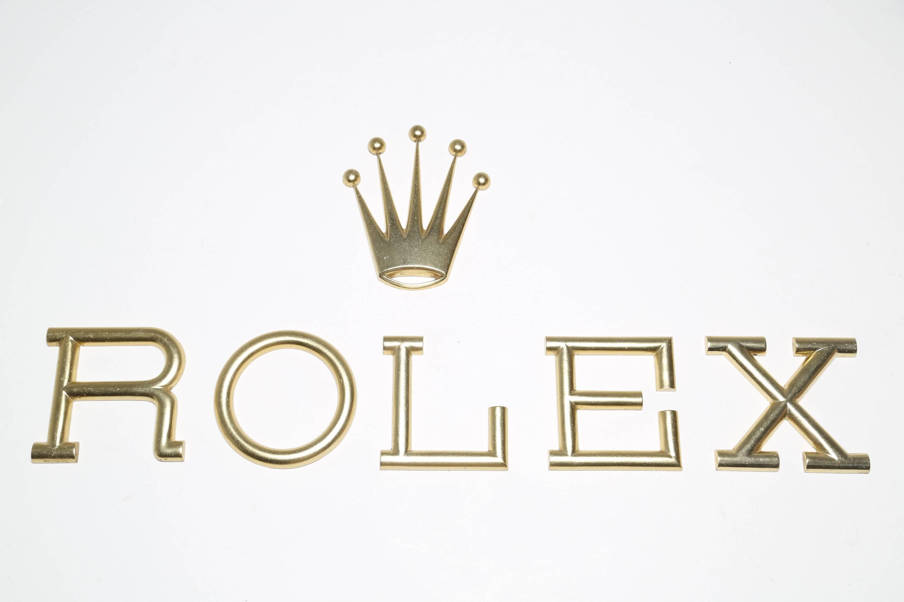 Original Rolex Shopfront sign in brass plated aluminium. Sourced in the mid 1980's from an old watch shop in Dublin. All individual letters to make up the Rolex sign, these letters are significantly bigger than any other brass letter Rolex signs