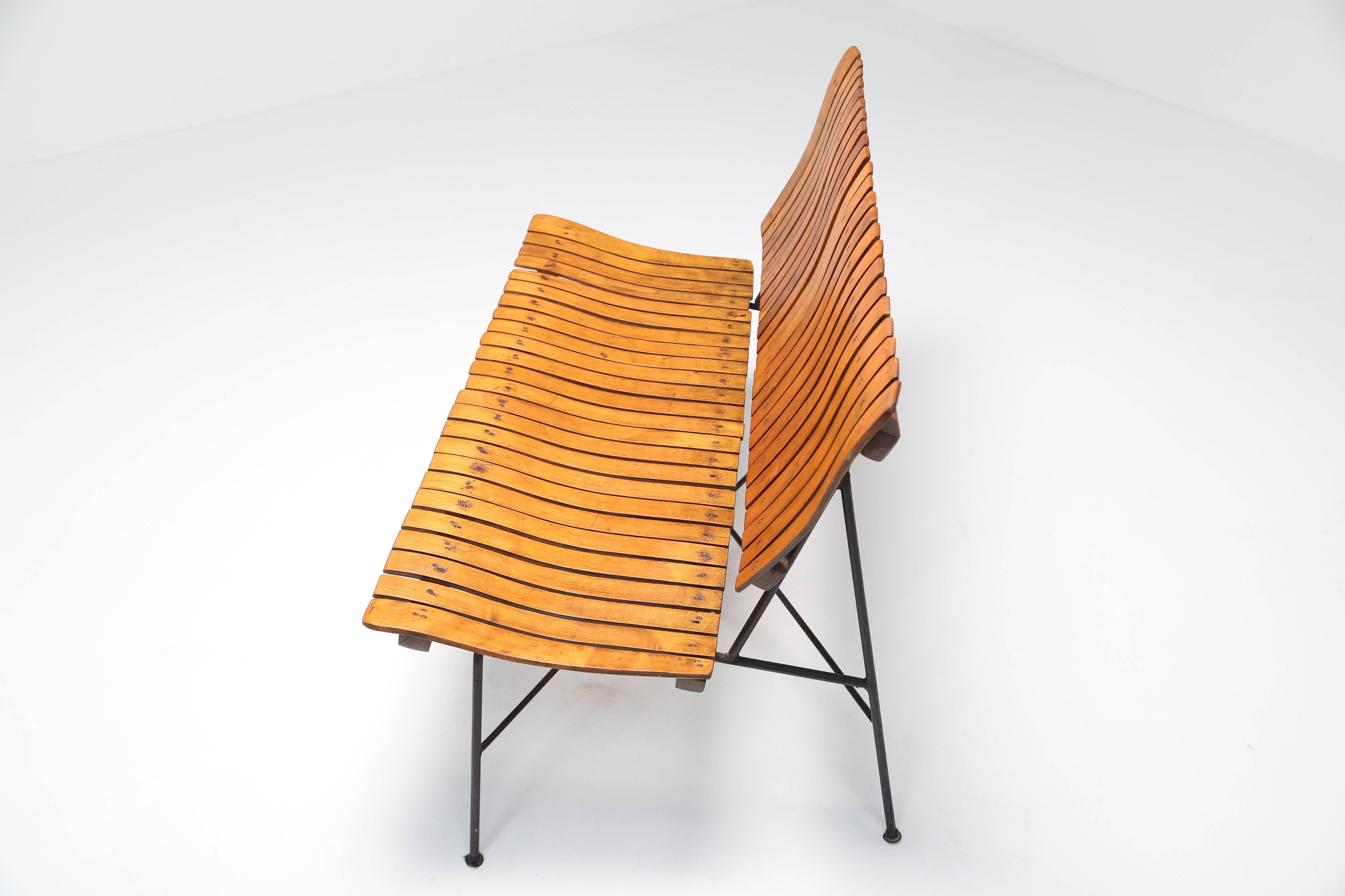 Mid-Century Modern Arthur Umanoff 1950s iron frame rustic style mid-century slatted bench. For Sale