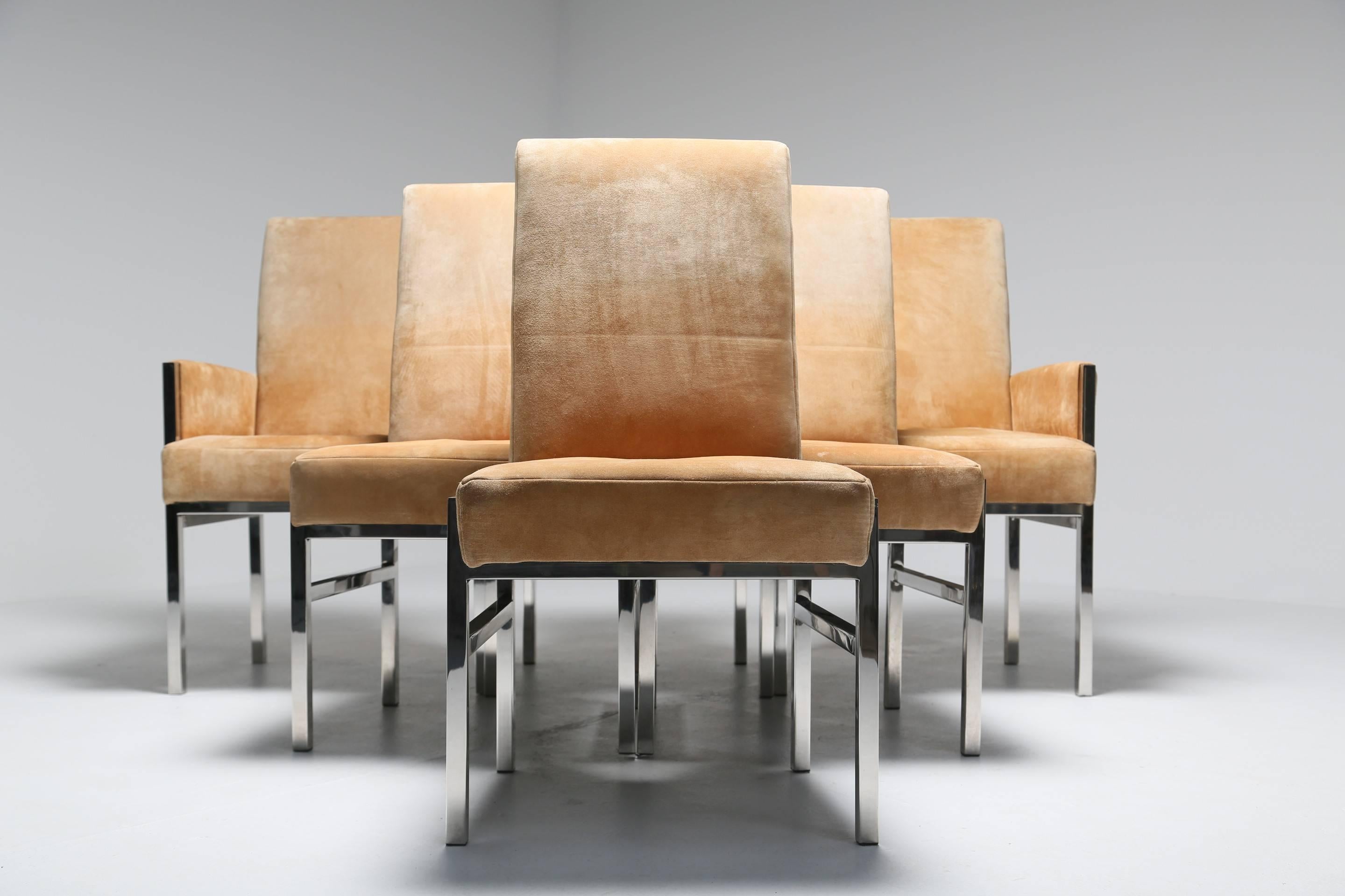 Six elegant and comfortable beige suede high backed dining chairs in the style of Milo Baughman on a chrome base, circa 1970. Four side chairs and two carvers, all in overall good condition but with some signs of use on the fabric as would be