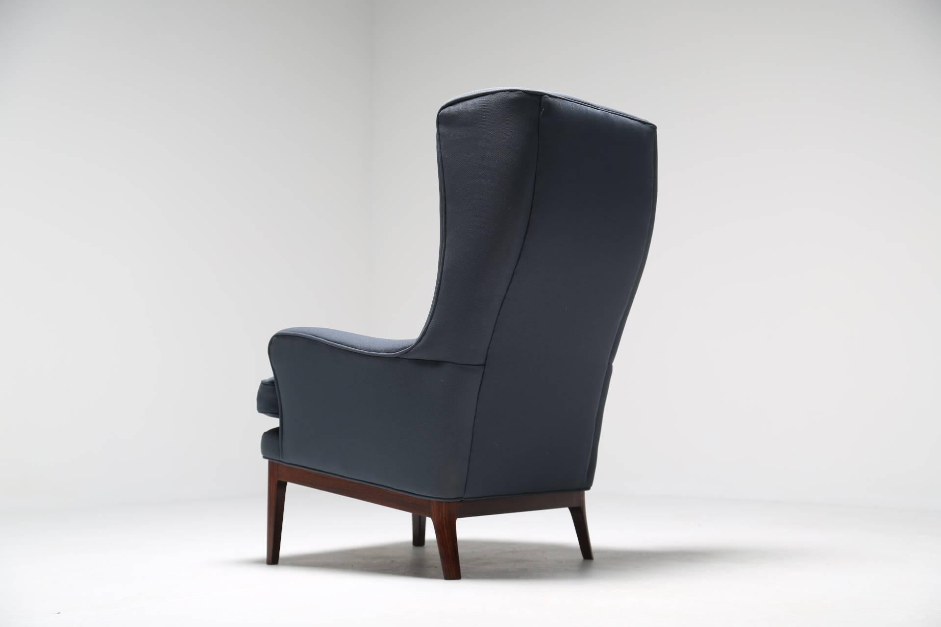 Mid-Century Modern Arne Norell wing armchair, hardwood frame, Scandinavian modern 1960s.