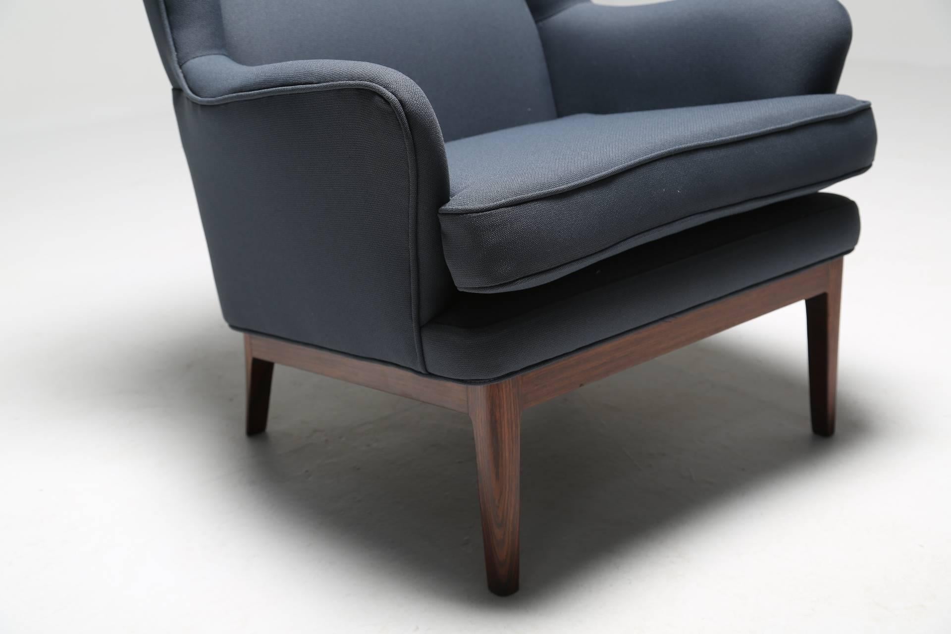 Mid-20th Century Arne Norell wing armchair, hardwood frame, Scandinavian modern 1960s.
