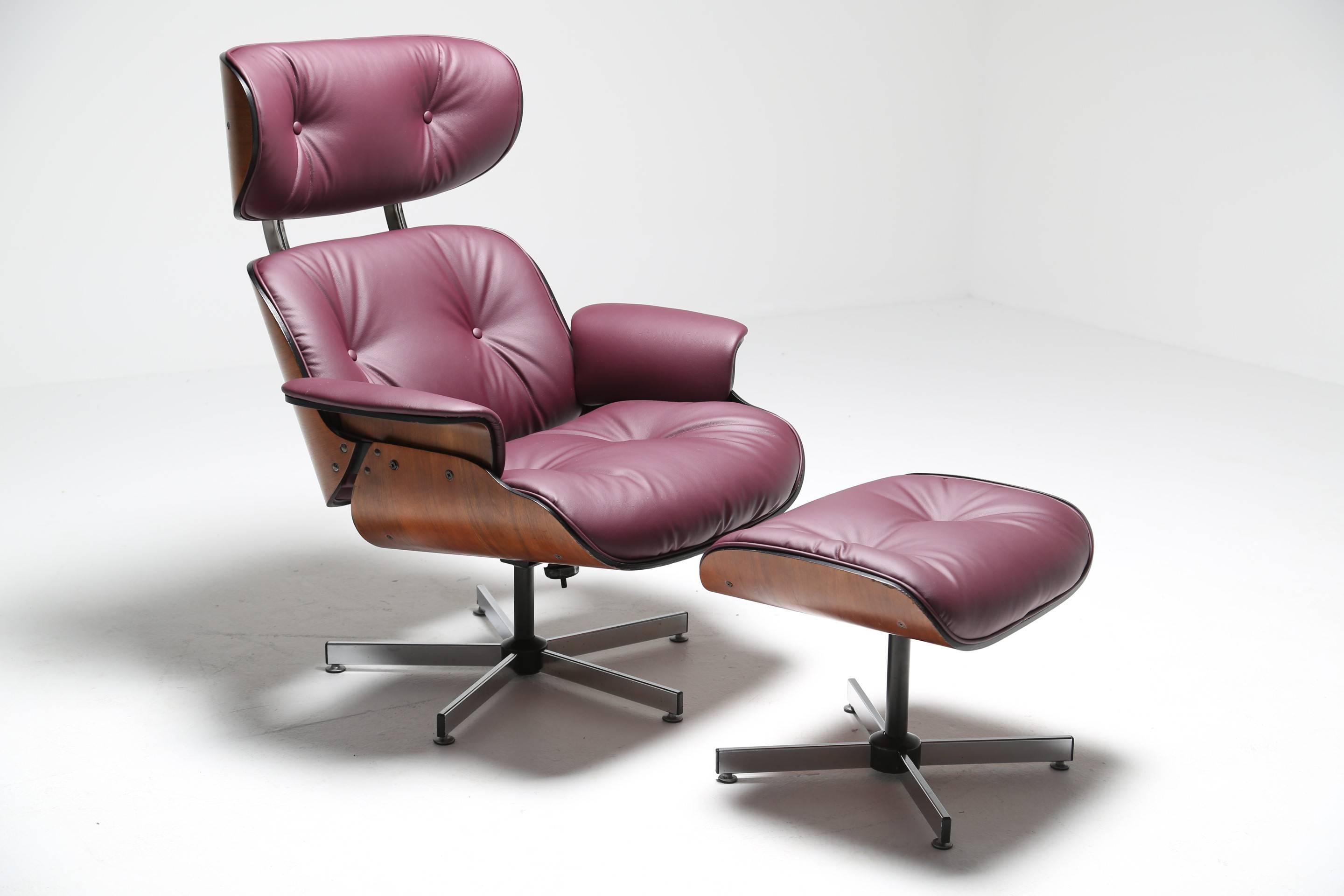 Made in the USA by Plycraft in the early 1970s, this swivel lounge chair and ottoman have been fully reupholstered to offer a modern twist on a Mid-Century staple. Traditionally this set would have been covered in black or brown but we have opted